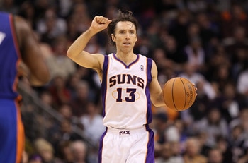 PHOENIX, AZ - JANUARY 07:  Steve Nash #13 of the Phoenix Suns handles the ball during the NBA game against the New York Knicks at US Airways Center on January 7, 2011 in Phoenix, Arizona.  The Knicks defeated the Suns 121-96.  NOTE TO USER: User expressly