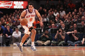 NEW YORK, NY - APRIL 22:  Landry Fields #6 of the New York Knicks brings the ball up court against the Boston Celtics in Game Three of the Eastern Conference Quarterfinals in the 2011 NBA Playoffs on April 22, 2011 at Madison Square Garden in New York Cit