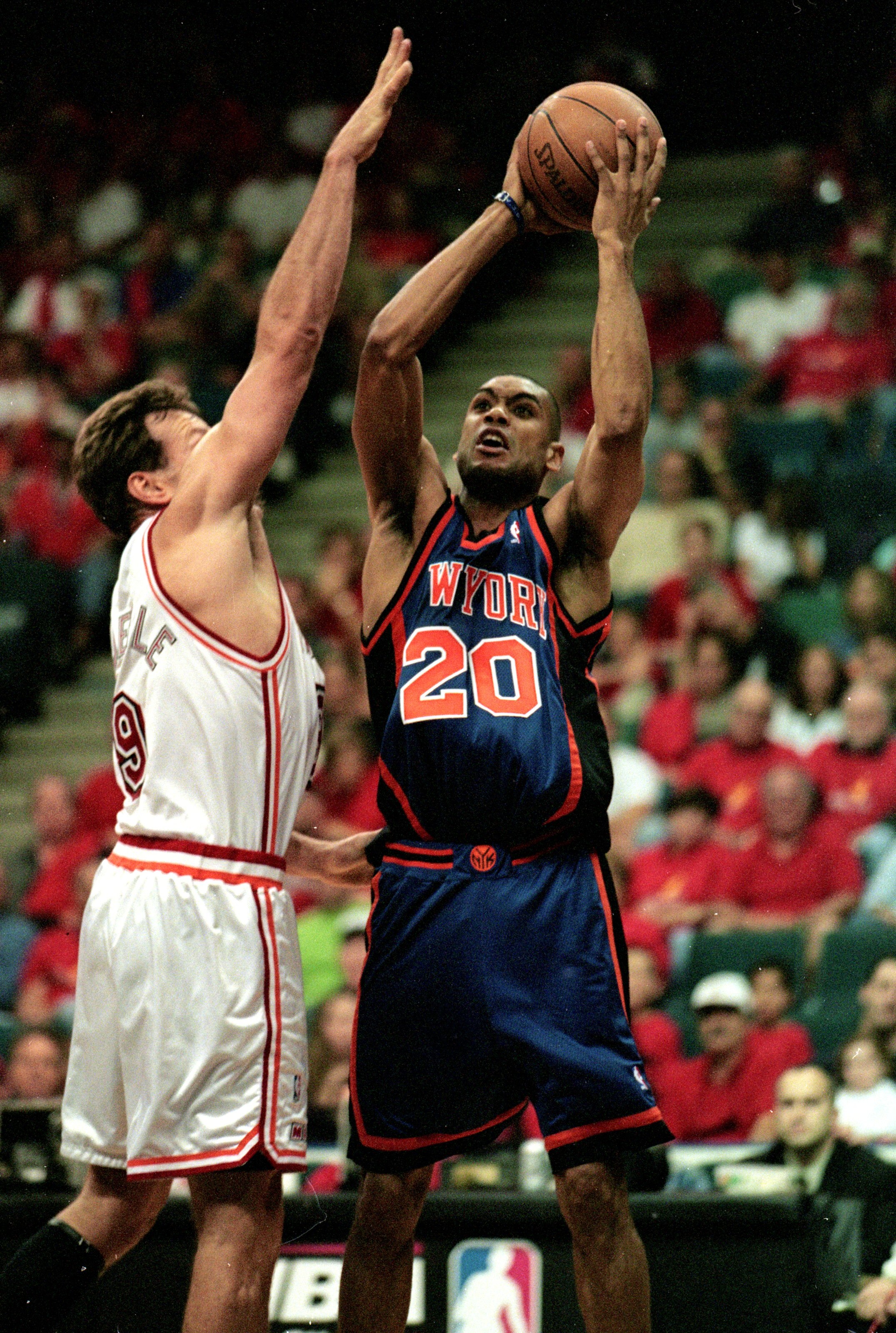 8 May 1999: Allan Houston #20 of the New York Knicks shoots the ball while Dan Majerle #9 of the Miami Heat tries to defend him during the first round play offs at the Miami Arena in Miami, Florida. The Knicks defeated the Heat 95-75.  Mandatory Credit: A
