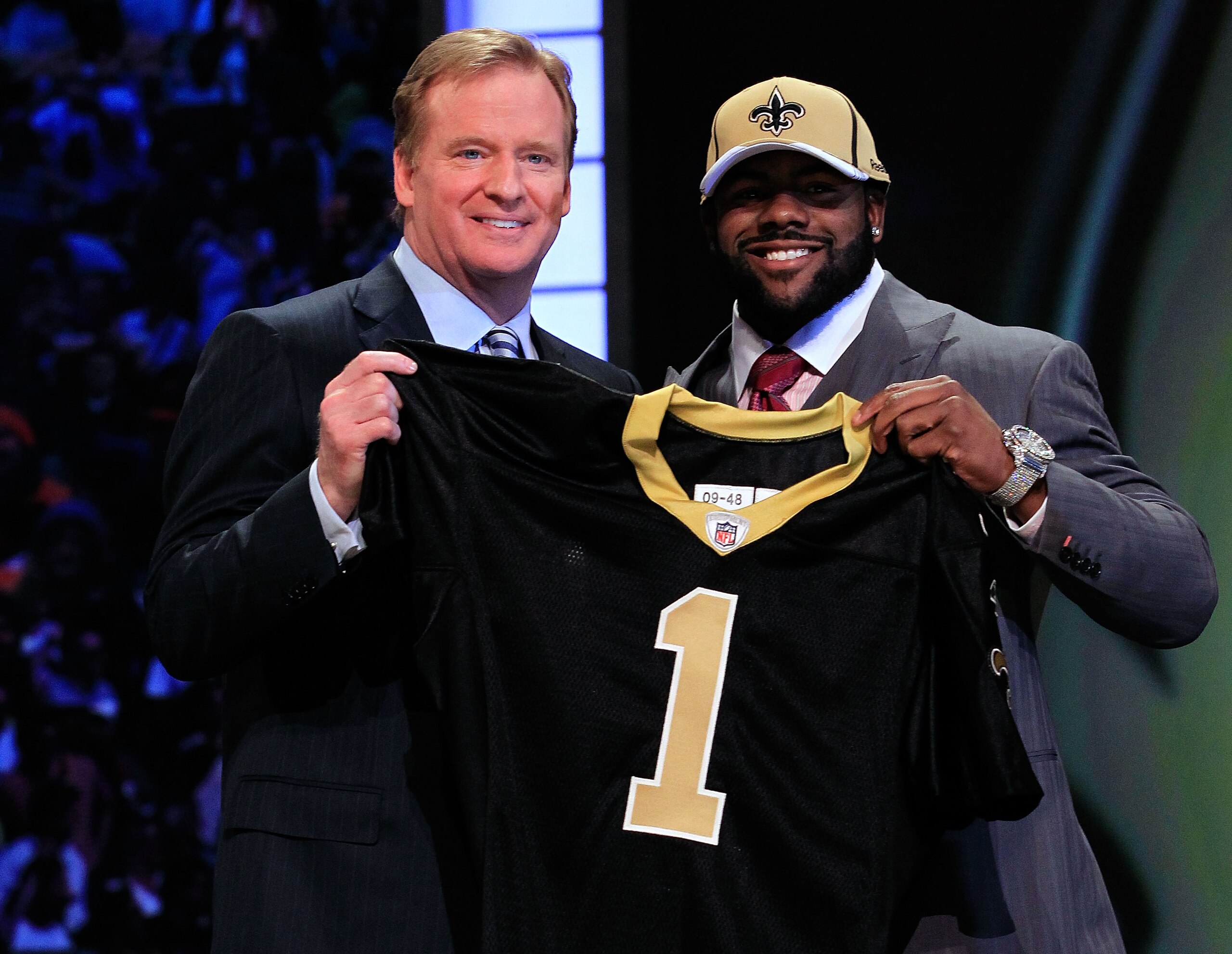 NEW YORK, NY - APRIL 28:  NFL Commissioner Roger Goodell (L) poses for a photo with Mark Ingram, #28 overall pick by the New Orleans Saints, holds up a jersey on stage during the 2011 NFL Draft at Radio City Music Hall on April 28, 2011 in New York City. 