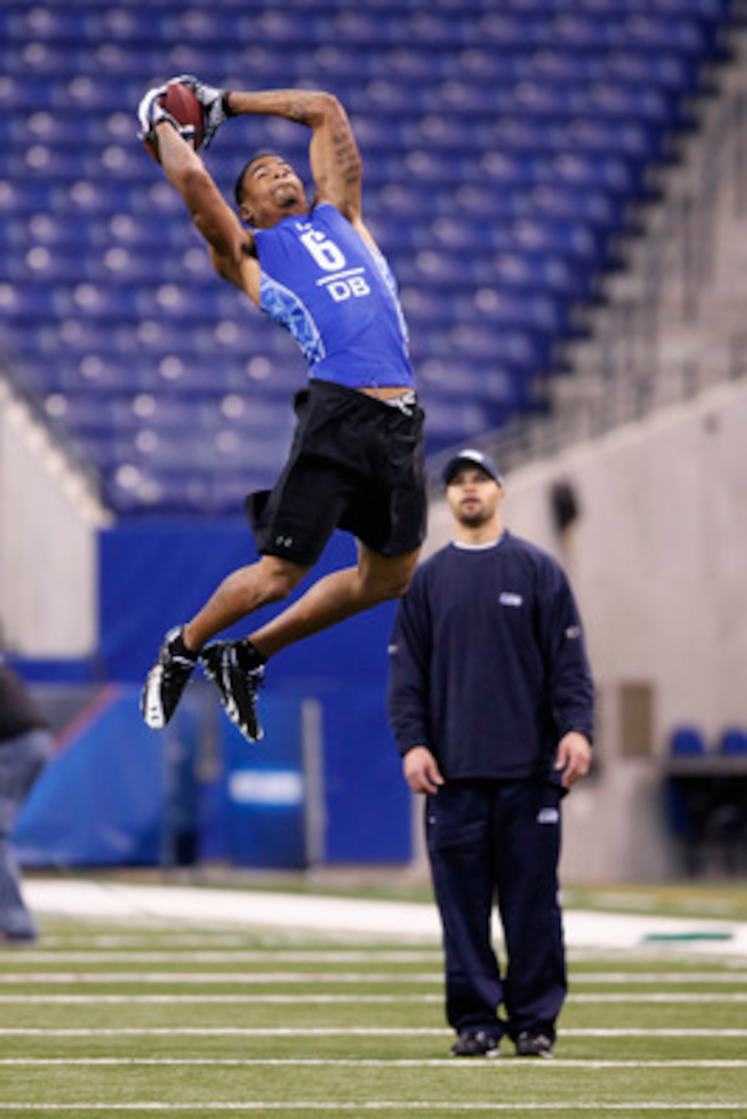 INDIANAPOLIS, IN - MARCH 1: Defensive back Curtis Brown #6 of Texas goes up for a pass during the 2011 NFL Scouting Combine at Lucas Oil Stadium on February 28, 2011 in Indianapolis, Indiana. (Photo by Joe Robbins/Getty Images)