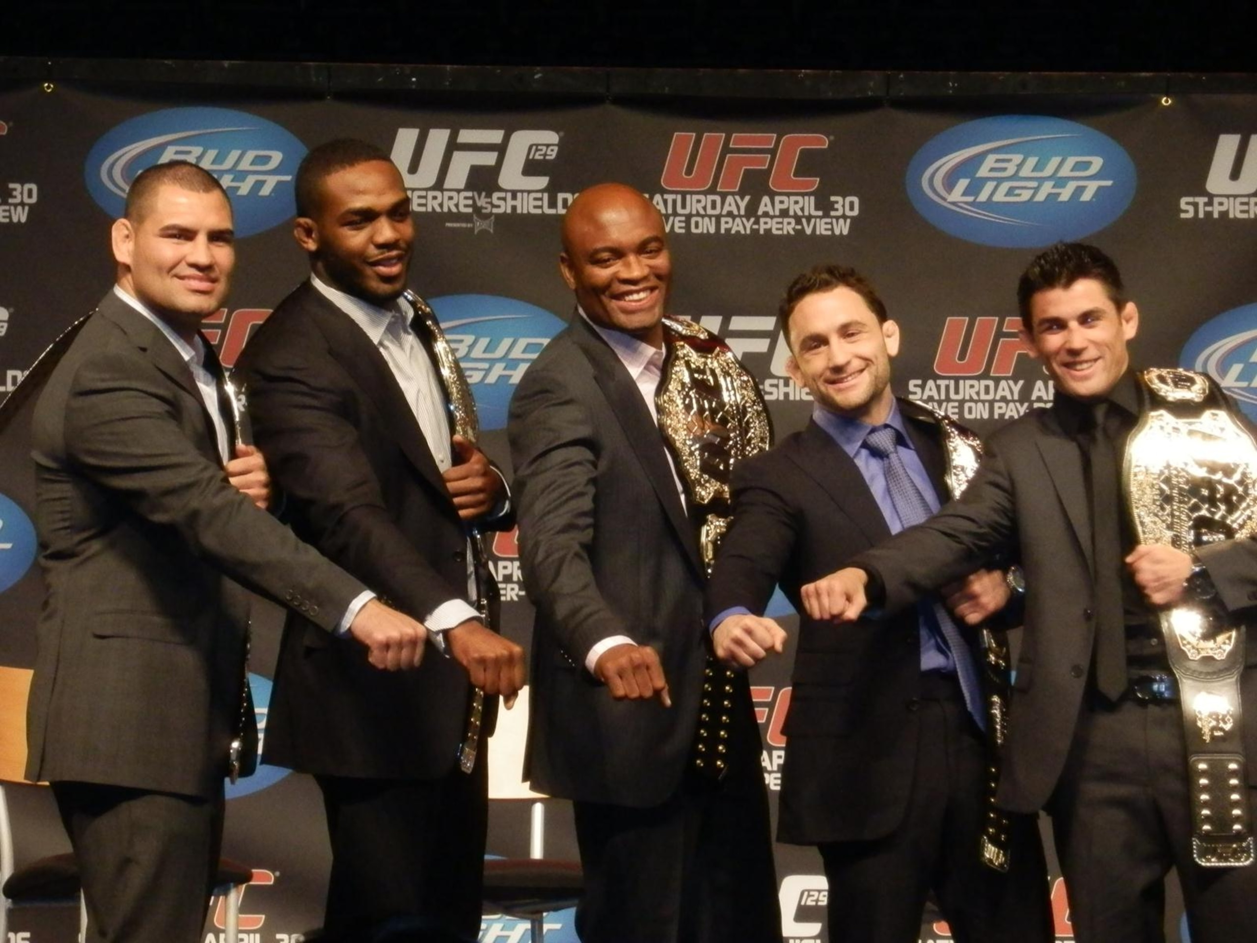 Dominick Cruz flashes his belt. Photo by Leon Horne.