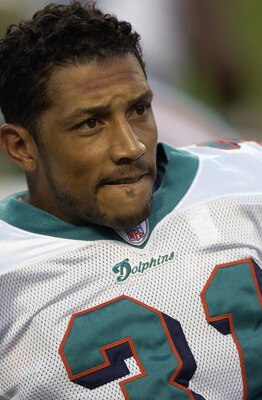 DENVER - OCTOBER 13:  Brock Marion of the Miami Dolphins during a game against the Denver Broncos on October 13, 2002 at INVESCO Field at Mile High in Denver, Colorado. The Dolphins defeated the Broncos 24-22. (Photo by Josh Merwin/Getty Images)