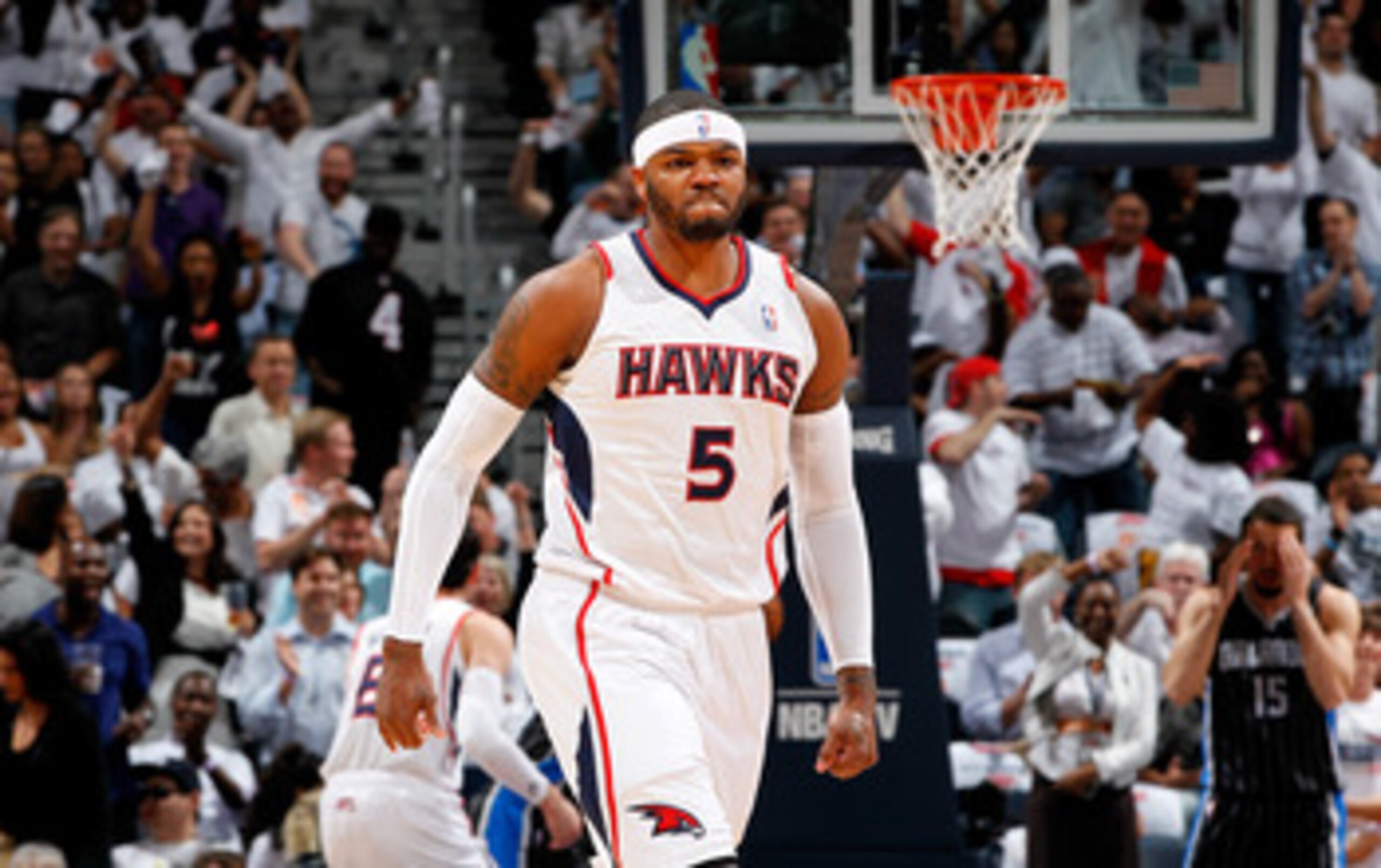 ATLANTA, GA - APRIL 28:  Josh Smith #5 of the Atlanta Hawks reacts after a dunk against the Orlando Magic during Game Six of the Eastern Conference Quarterfinals in the 2011 NBA Playoffs at Philips Arena on April 28, 2011 in Atlanta, Georgia.  NOTE TO USE