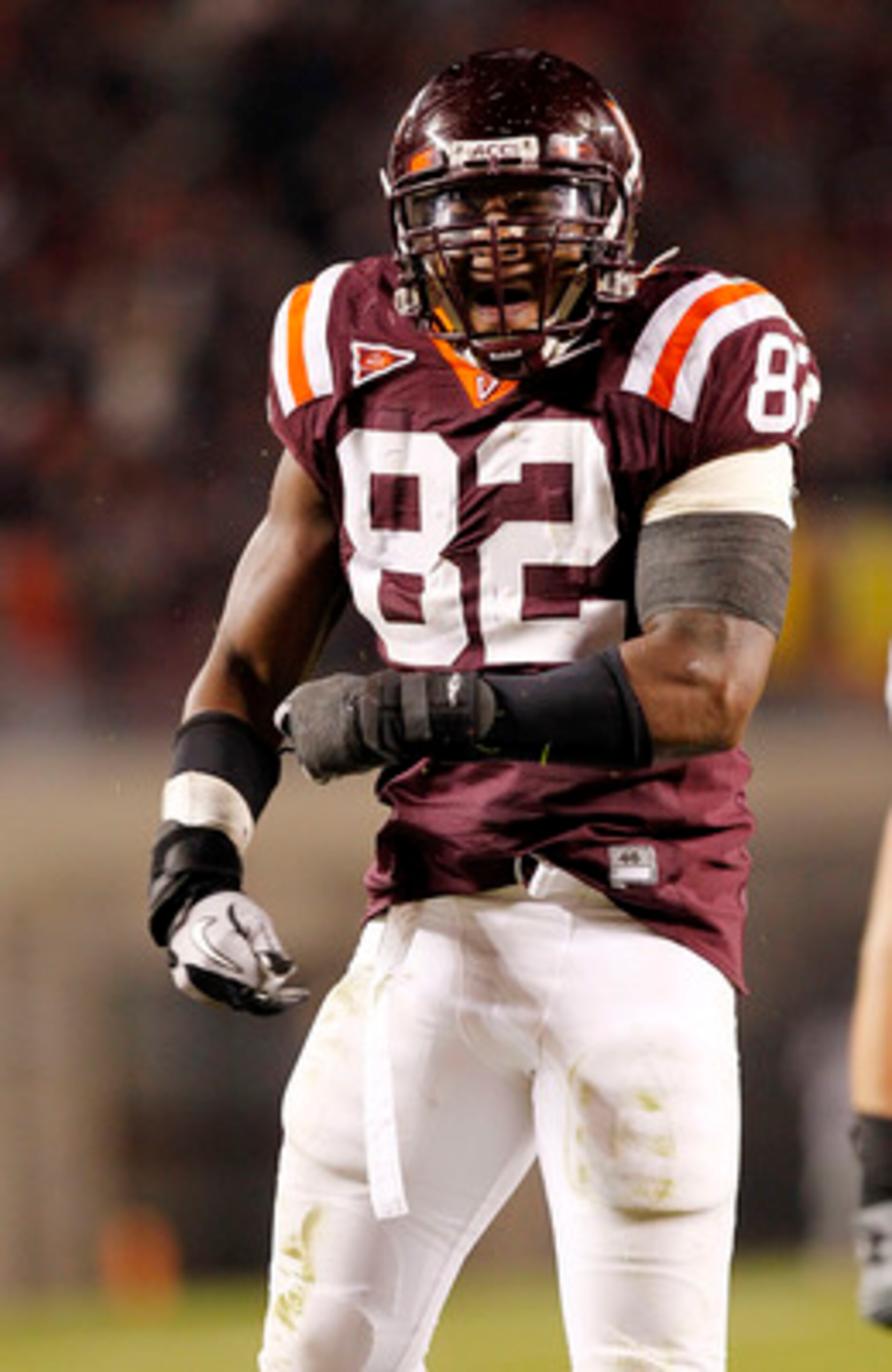 BLACKSBURG, VA - NOVEMBER 04: Defensive end Steven Friday #82 of the Virginia Tech Hokies celebrates after making a tackle against the Georgia Tech Yellow Jackets at Lane Stadium on November 4, 2010 in Blacksburg, Virginia. (Photo by Geoff Burke/Getty Im BLACKSBURG, VA - NOVEMBER 04: Defensive end Steven Friday #82 of the Virginia Tech Hokies celebrates after making a tackle against the Georgia Tech Yellow Jackets at Lane Stadium on November 4, 2010 in Blacksburg, Virginia. (Photo by Geoff Burke/Getty Im