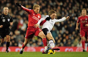 LONDON, ENGLAND - NOVEMBER 28:  Leiva Lucas of Liverpool and Luka Modric of Tottenham Hotspur battle for the ball during the Barclays Premier League match between Tottenham Hotspur and Liverpool at White Hart Lane on November 28, 2010 in London, England.