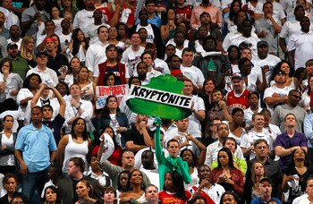 ATLANTA, GA - APRIL 28:  A fan hold up a neon green sign with the words 'Kryptonite' written on it during Game Six of the Eastern Conference Quarterfinals in the 2011 NBA Playoffs between the Atlanta Hawks and the Orlando Magic at Philips Arena on April 2