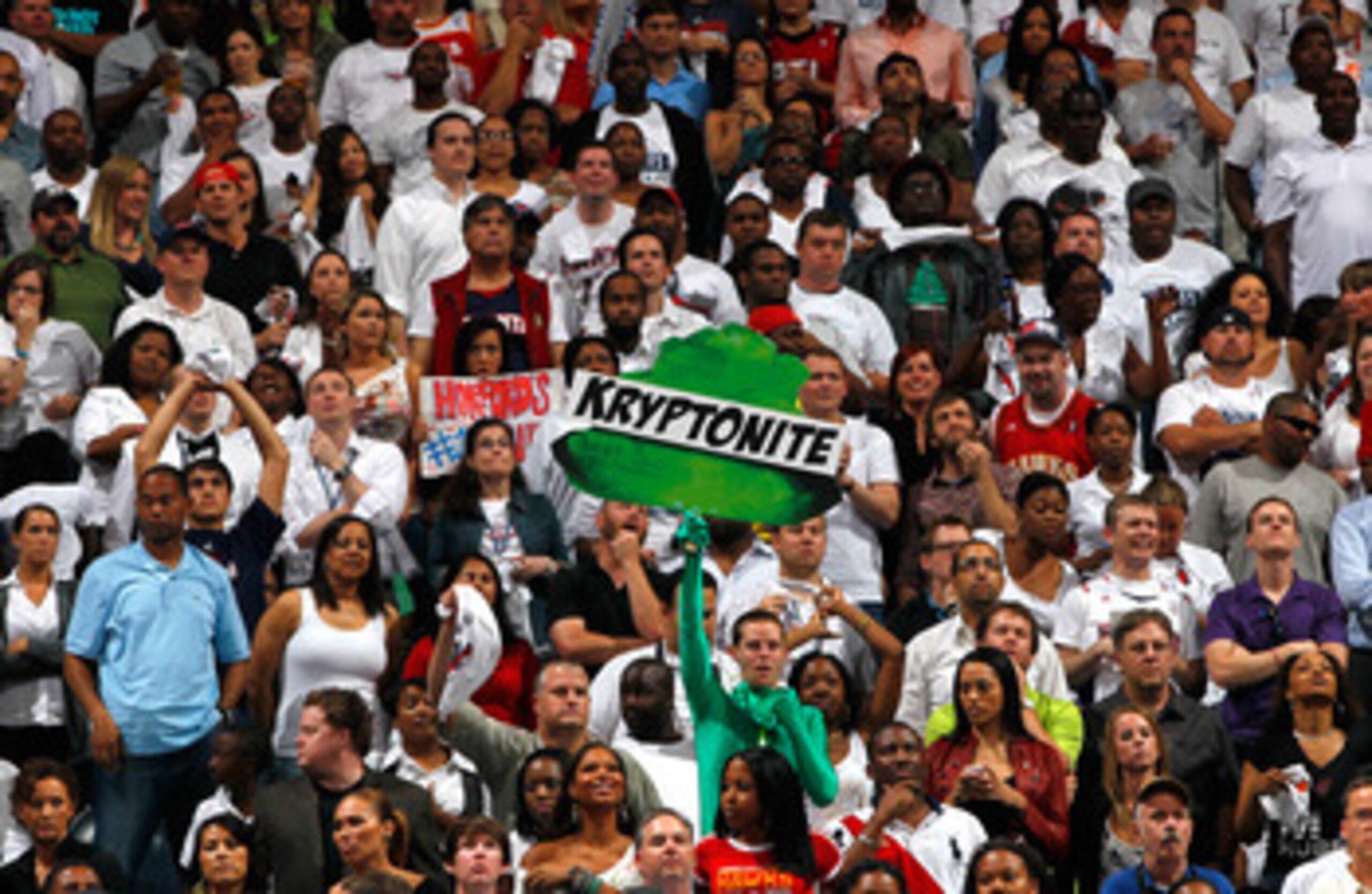ATLANTA, GA - APRIL 28:  A fan hold up a neon green sign with the words 'Kryptonite' written on it during Game Six of the Eastern Conference Quarterfinals in the 2011 NBA Playoffs between the Atlanta Hawks and the Orlando Magic at Philips Arena on April 2