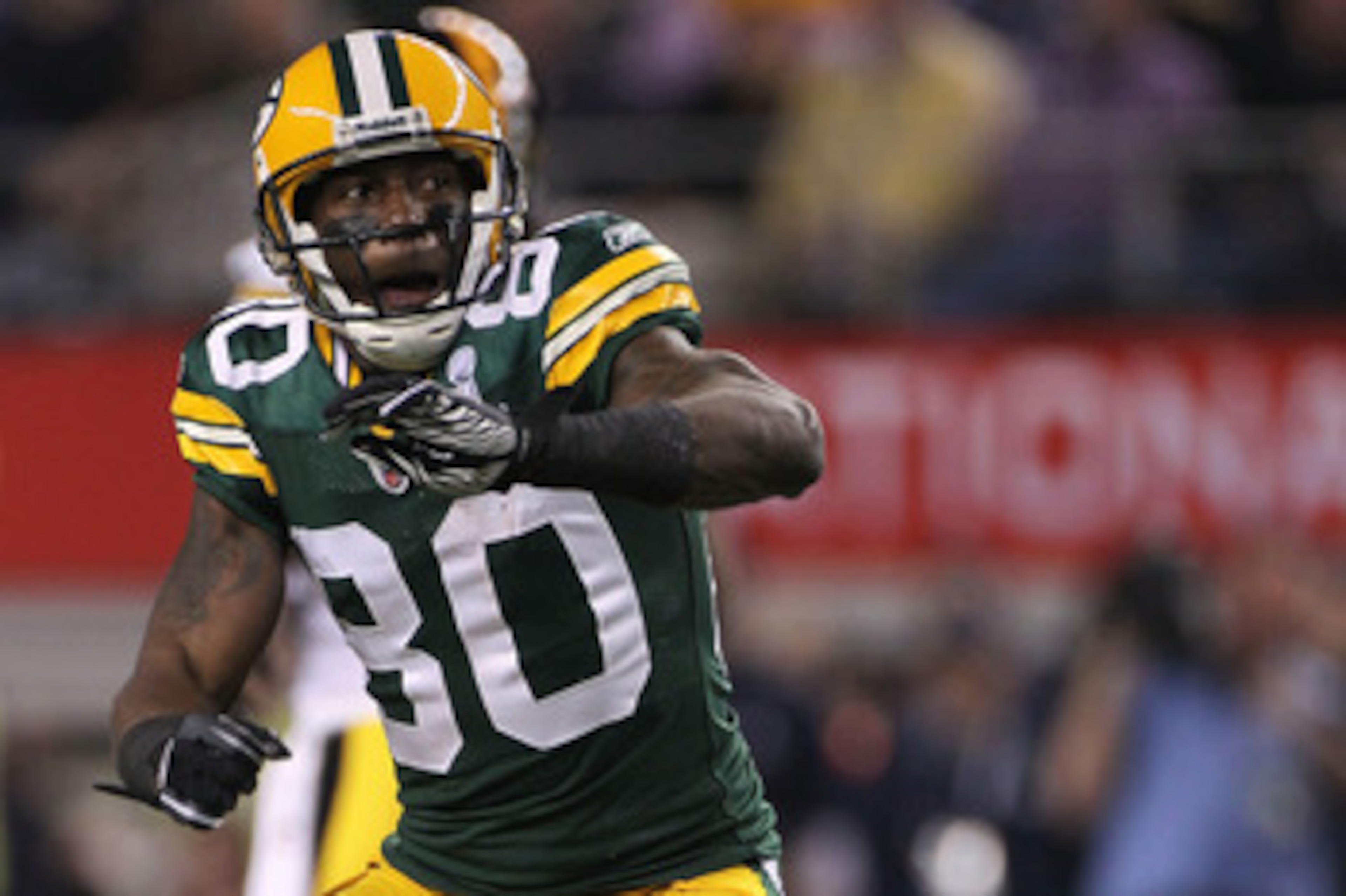 ARLINGTON, TX - FEBRUARY 06:  Donald Driver #80 of the Green Bay Packers reacts after catching a 24 yard pass against the Pittsburgh Steelers during the first quarter of Super Bowl XLV at Cowboys Stadium on February 6, 2011 in Arlington, Texas.  (Photo by
