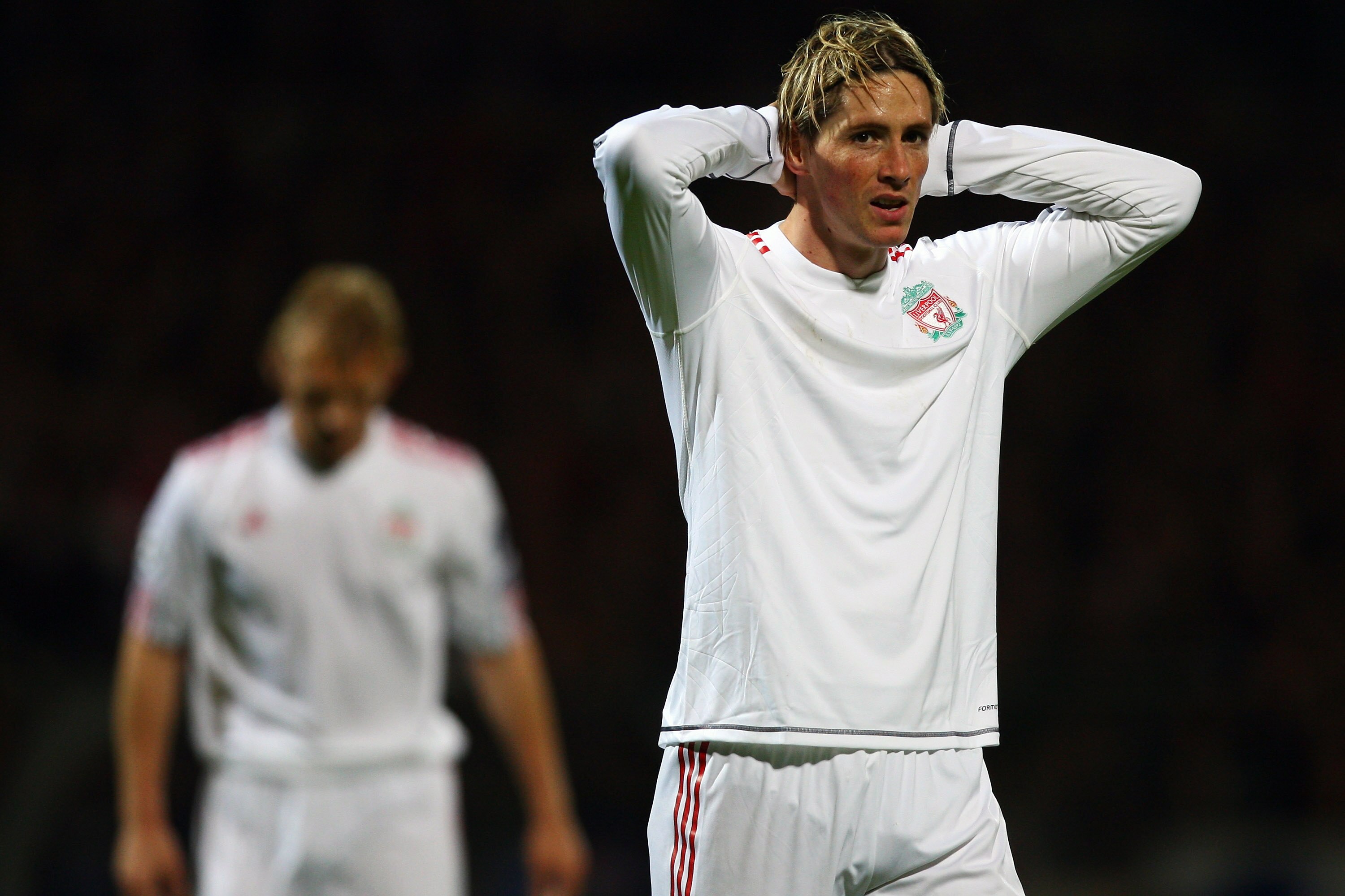 LYON, FRANCE - NOVEMBER 04:  Fernando Torres (R) of Liverpool rues a missed chance during the Lyon v Liverpool UEFA Champions League Group E match at the Stade de Gerland on November 4, 2009 in Lyon, France.  (Photo by Michael Steele/Getty Images)