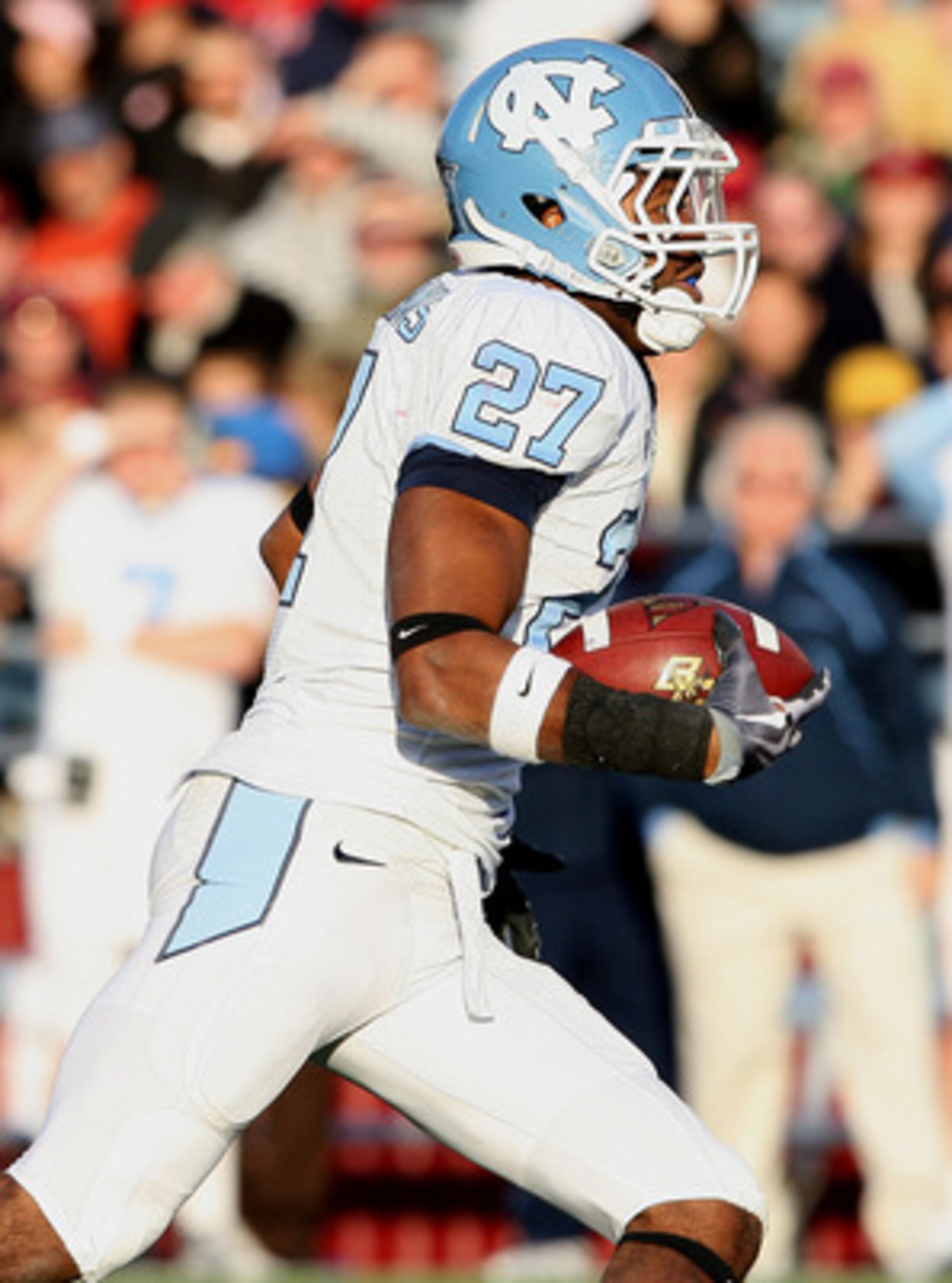 CHESTNUT HILL, MA - NOVEMBER 21: Deunta Williams #27 of the North Carolina Tar Heels carries the ball after he intercepted a pass in the fourth quarter against the Boston College Eagles on November 21, 2009 at Alumni Stadium in Chestnut Hill, Massachuset CHESTNUT HILL, MA - NOVEMBER 21: Deunta Williams #27 of the North Carolina Tar Heels carries the ball after he intercepted a pass in the fourth quarter against the Boston College Eagles on November 21, 2009 at Alumni Stadium in Chestnut Hill, Massachuset