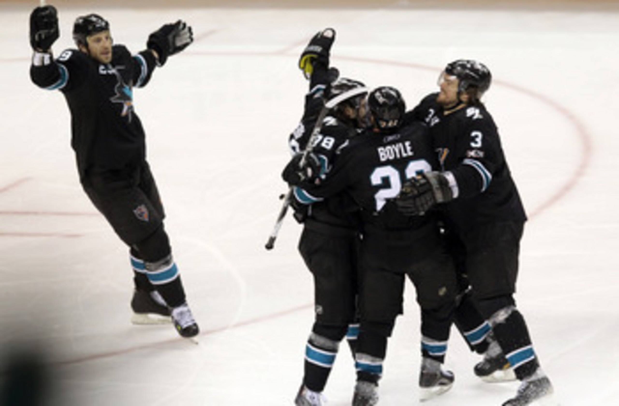 SAN JOSE, CA - APRIL 29:  Benn Ferriero #78 of the San Jose Sharks is congratulated by teammates after he scored the winning goal in overtime of their game against the Detroit Red Wings in Game One of the Western Conference Semifinals during the 2011 NHL