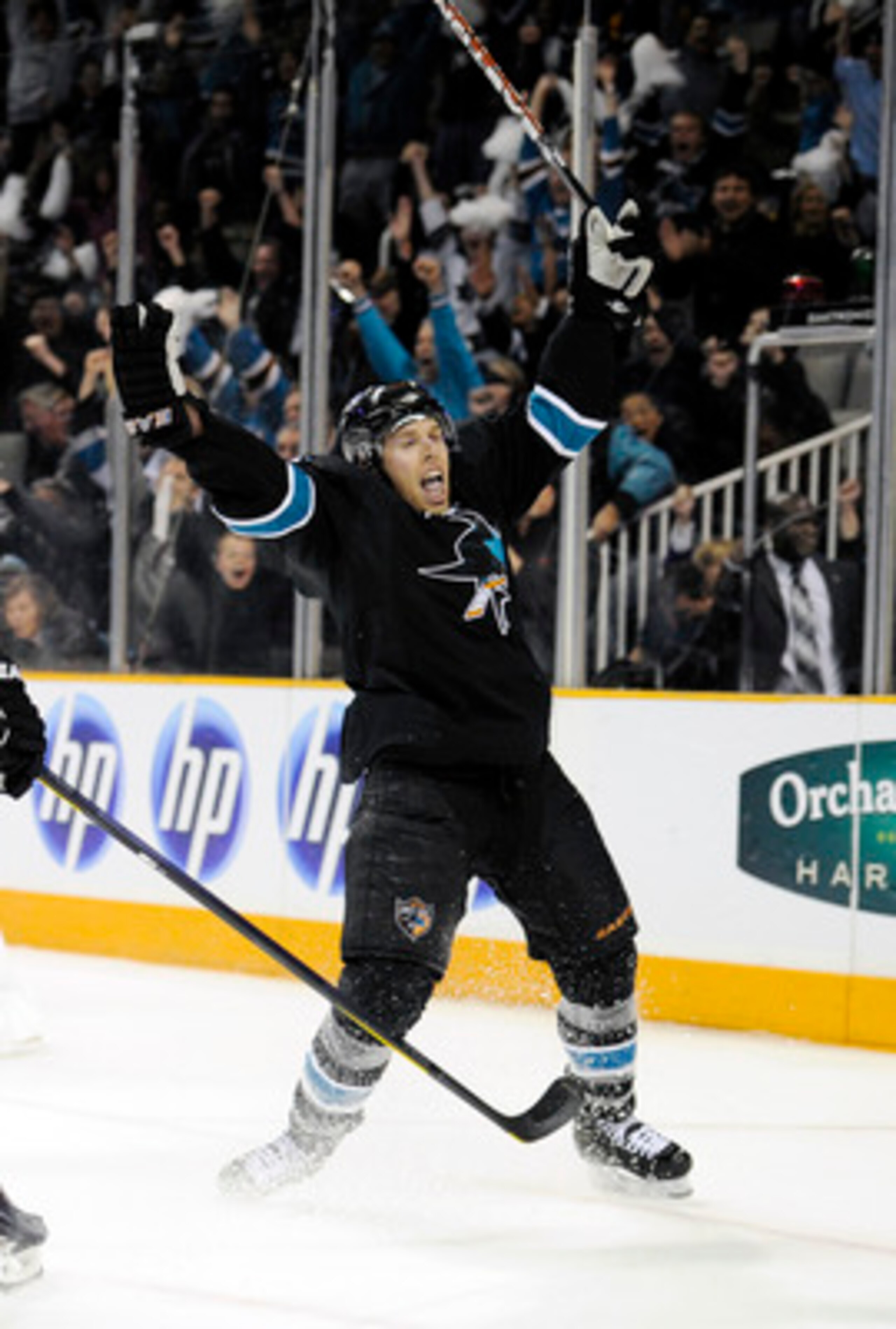 SAN JOSE, CA - APRIL 14: Joe Pavelski #8 of the San Jose Sharks celebrates after scoring the winning goal in overtime against the Los Angeles Kings in Game One of the Western Conference Quarterfinals  during the 2011 NHL Stanley Cup Playoffs at the HP Pav