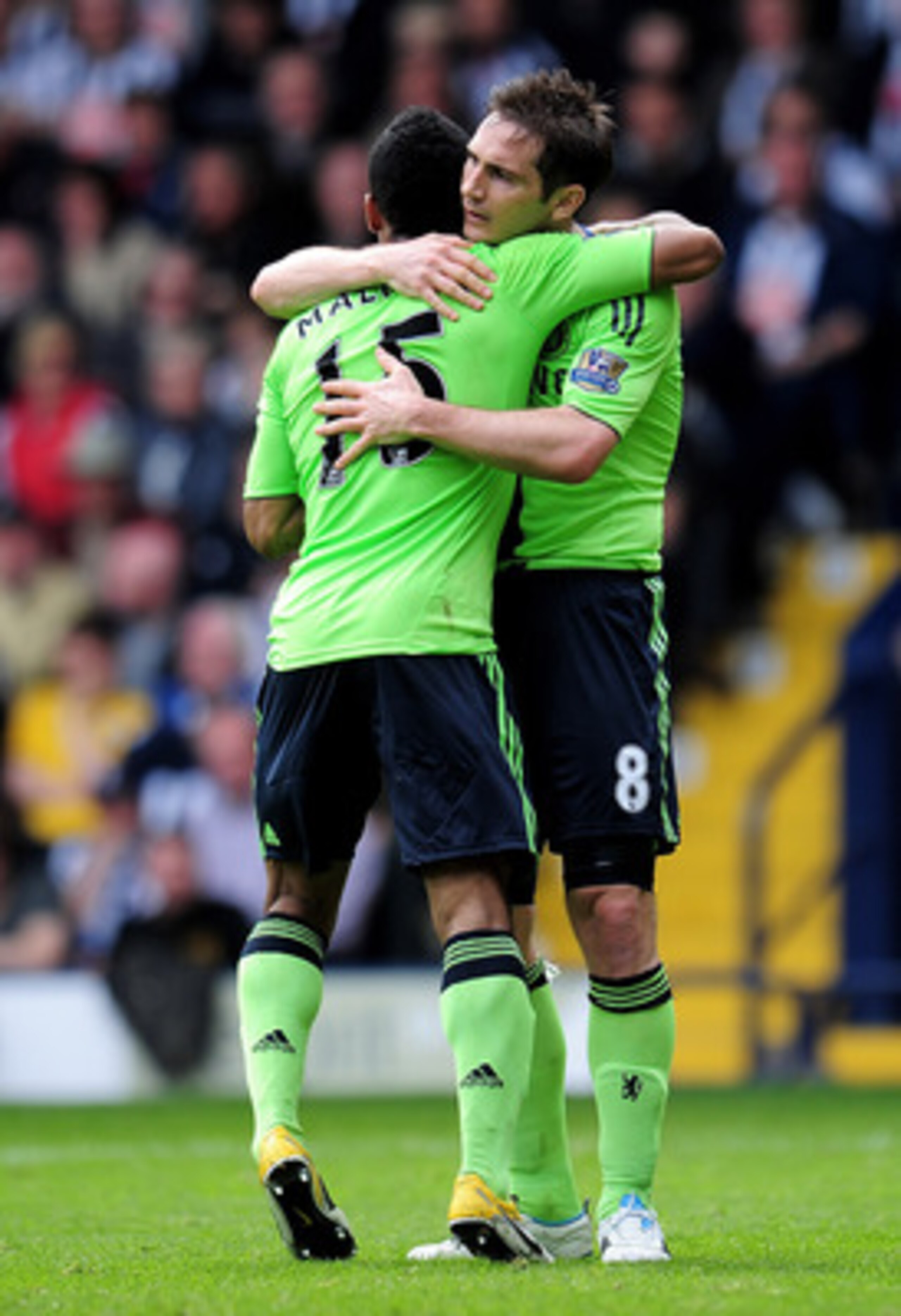 WEST BROMWICH, ENGLAND - APRIL 16:  Frank Lampard of Chelsea celebrates scoring his team's third goal with team mate Florent Malouda (L) during the Barclays Premier League match between West Bromich Albion and Chelsea at The Hawthorns on April 16, 2011 in