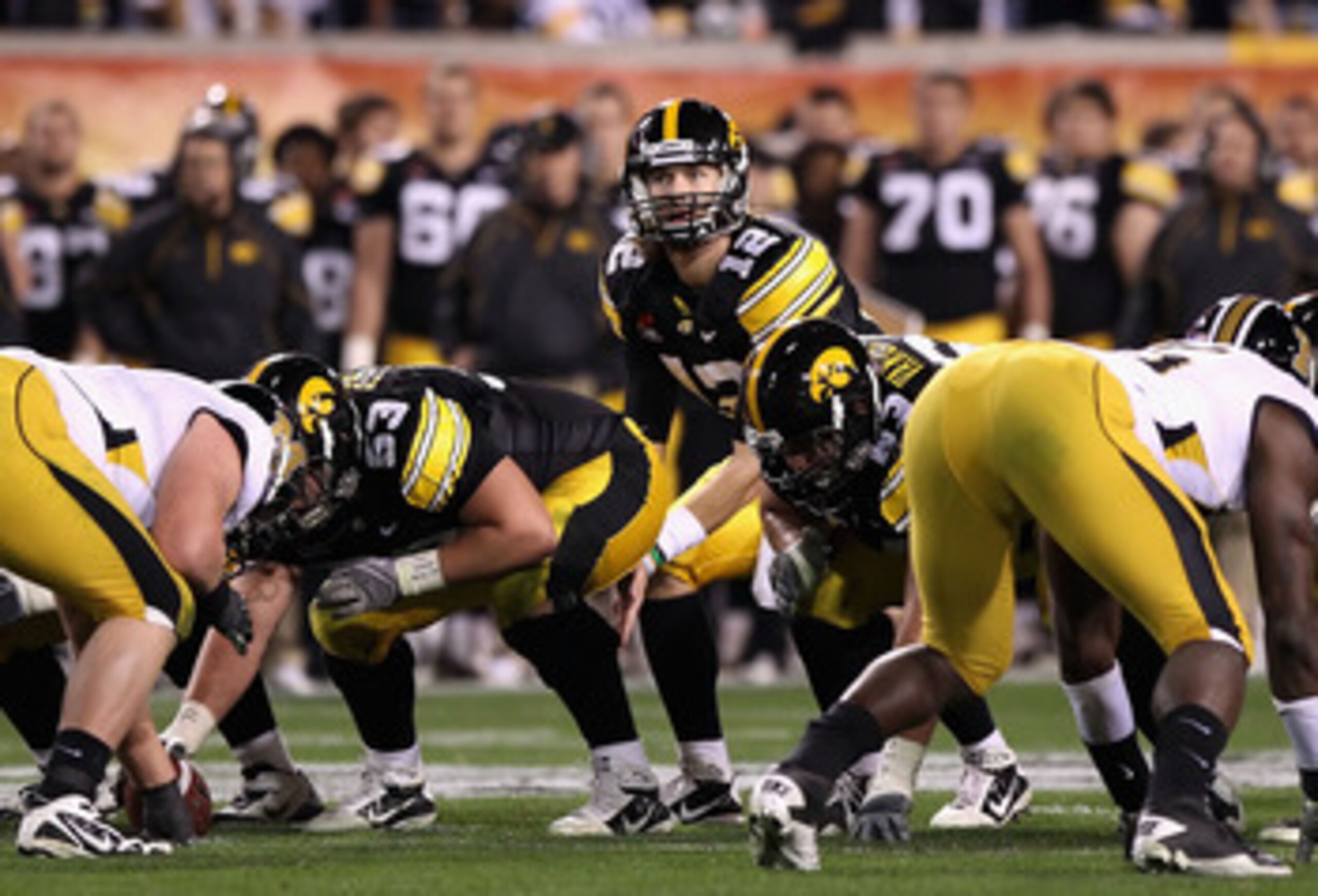 TEMPE, AZ - DECEMBER 28:  Quarterback Ricky Stanzi #12 of the Iowa Hawkeyes prepares to snap the ball during the Insight Bowl against the Missouri Tigers at Sun Devil Stadium on December 28, 2010 in Tempe, Arizona.  The Hawkeyes defeated the Tigers 27-24.