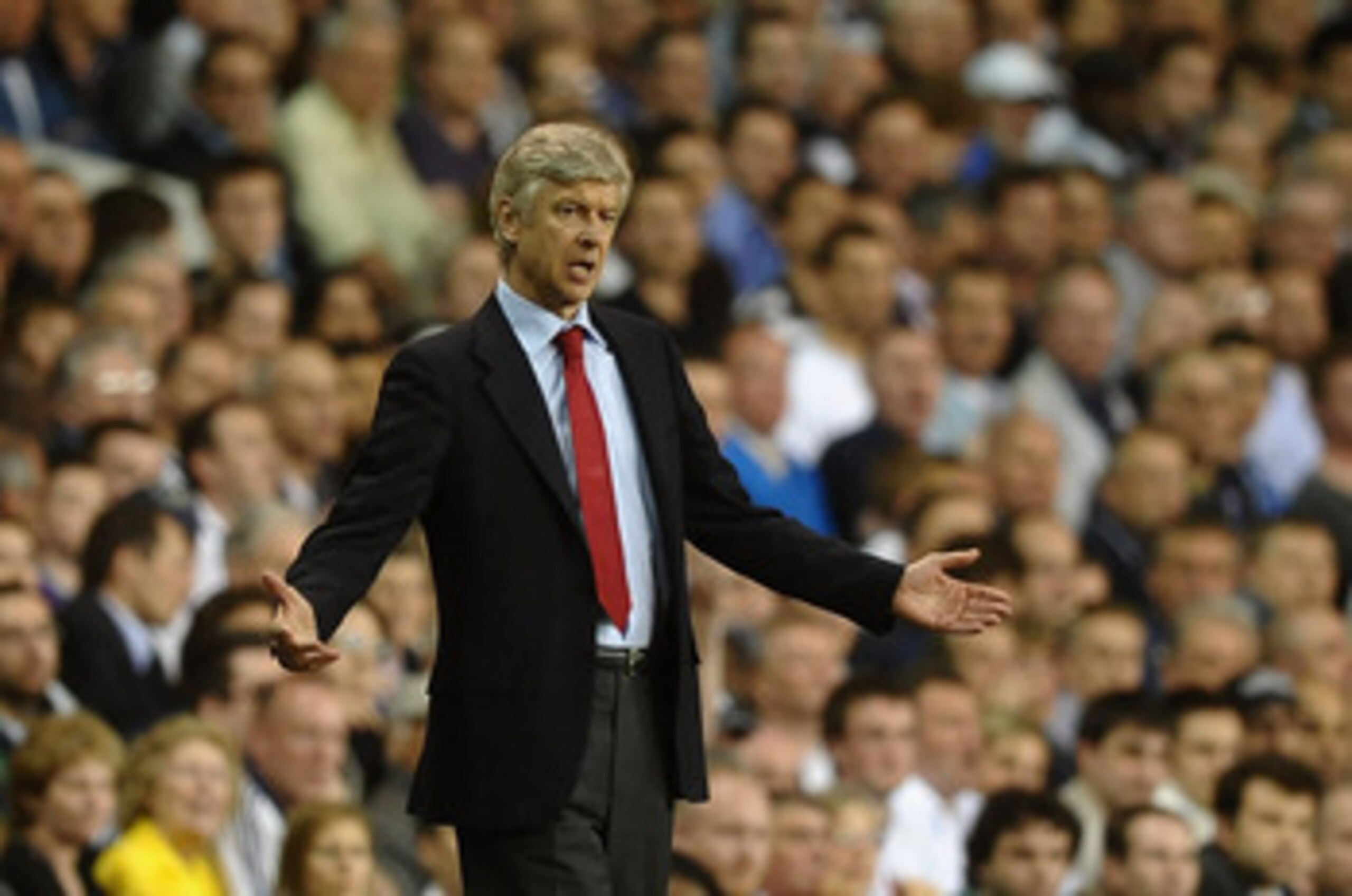 LONDON, ENGLAND - APRIL 20:  Manager Arsene Wenger of Arsenal gestures uring the Barclays Premier League match between Tottenham Hotspur and Arsenal at White Hart Lane on April 20, 2011 in London, England.  (Photo by Laurence Griffiths/Getty Images)