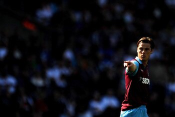 BOLTON, ENGLAND - APRIL 09:  Scott Parker of West Ham United gestures during the Barclays Premier League match between Bolton Wanderers and West Ham United at Reebok Stadium on April 9, 2011 in Bolton, England.  (Photo by Chris Brunskill/Getty Images)