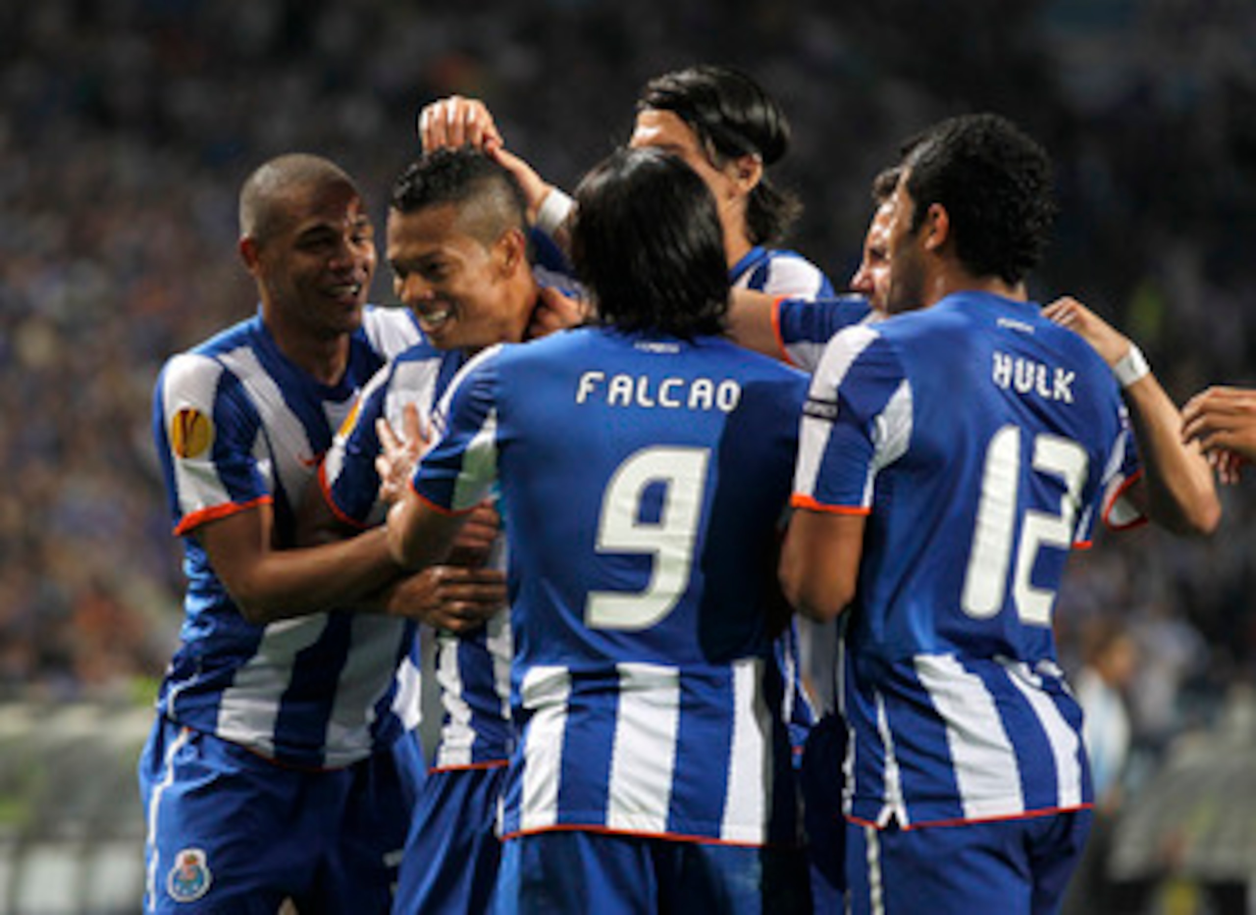 PORTO, PORTUGAL - APRIL 28: Fredy Guarin (2nd L) of FC Porto celebrates with team mates after scoring his side second goal during the UEFA Europa League semi final first leg match between FC Porto and Villarreal at Estadio do Dragao on April 28, 2011 in PORTO, PORTUGAL - APRIL 28: Fredy Guarin (2nd L) of FC Porto celebrates with team mates after scoring his side second goal during the UEFA Europa League semi final first leg match between FC Porto and Villarreal at Estadio do Dragao on April 28, 2011 in