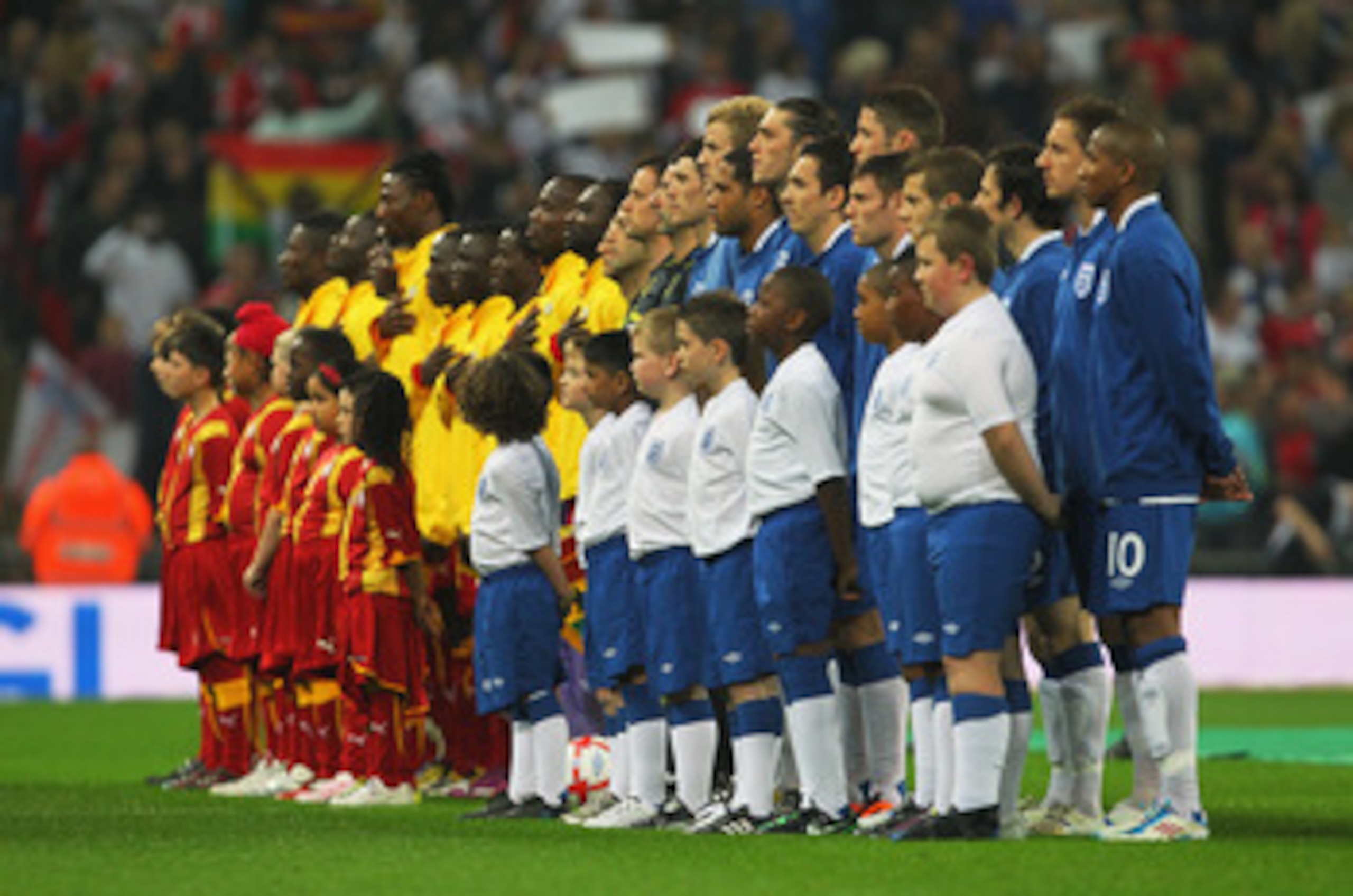 LONDON, ENGLAND - MARCH 29: The teams line up for the national anthems prior to the international friendly match between England and Ghana at Wembley Stadium on March 29, 2011 in London, England. (Photo by Clive Rose/Getty Images) LONDON, ENGLAND - MARCH 29: The teams line up for the national anthems prior to the international friendly match between England and Ghana at Wembley Stadium on March 29, 2011 in London, England. (Photo by Clive Rose/Getty Images)