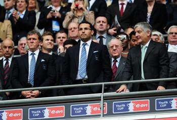 LONDON, ENGLAND - APRIL 16:  FA Chairman David Bernstein (R), Manchester City Chairman Khaldoon Al Mubarak (C) and Chief Executive Garry Cook look on prior to the FA Cup sponsored by E.ON semi final match between Manchester City and Manchester United at W