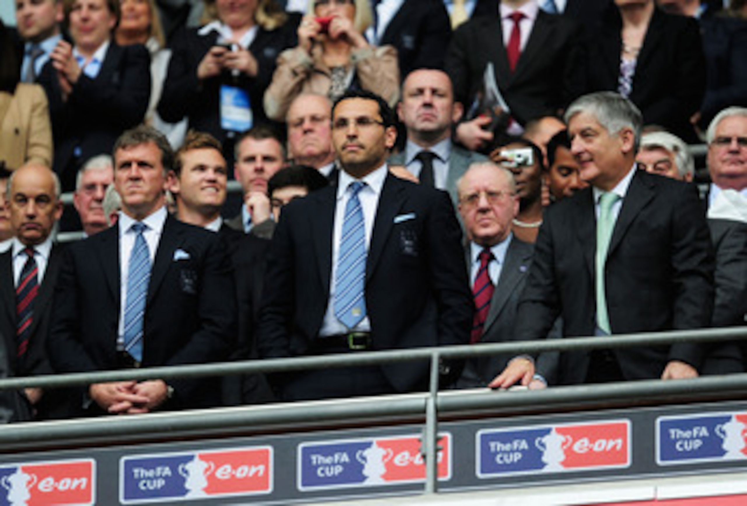 LONDON, ENGLAND - APRIL 16: FA Chairman David Bernstein (R), Manchester City Chairman Khaldoon Al Mubarak (C) and Chief Executive Garry Cook look on prior to the FA Cup sponsored by E.ON semi final match between Manchester City and Manchester United at W LONDON, ENGLAND - APRIL 16: FA Chairman David Bernstein (R), Manchester City Chairman Khaldoon Al Mubarak (C) and Chief Executive Garry Cook look on prior to the FA Cup sponsored by E.ON semi final match between Manchester City and Manchester United at W
