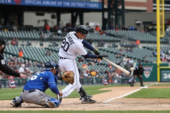 DETROIT - APRIL 13: Scott Sizemore #20 of the Detroit Tigers doubles down the left field line in the seventh inning scoring Gerald Laird #8 from second base against the Kansas City Royals on April 13, 2010 at Comerica Park in Detroit, Michigan. The Detroi