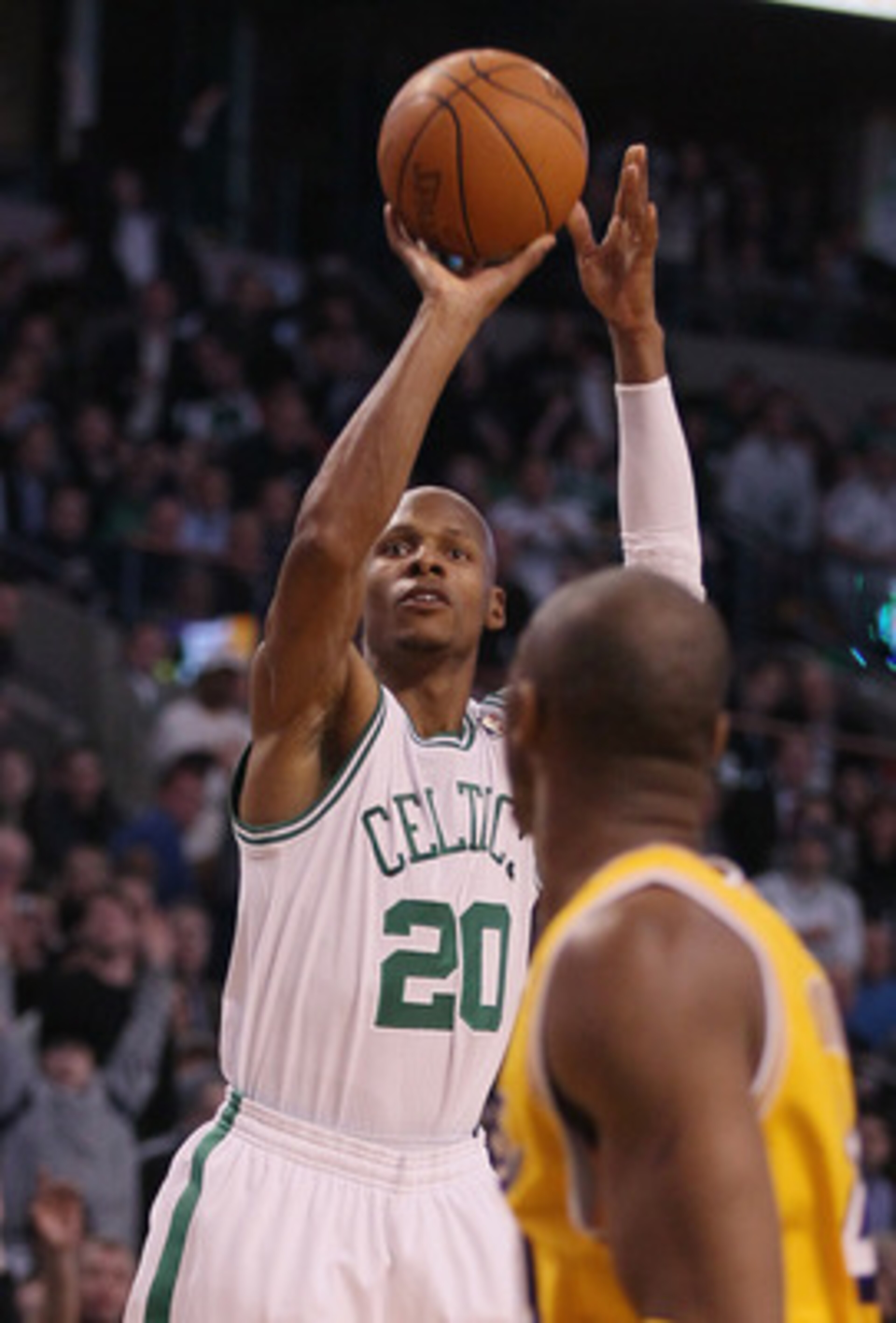 BOSTON, MA - FEBRUARY 10:  Ray Allen #20 of the Boston Celtics breaks the all time 3-point shot record with this three pointer as Kobe Bryant #24 of the Los Angeles Lakers defends on February 10, 2011 at the TD Garden in Boston, Massachusetts.  NOTE TO US