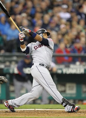SEATTLE, WA - APRIL 08:  Carlos Santana #41 of the Cleveland Indians bats against the Seattle Mariners during the Mariners' home opener at Safeco Field on April 8, 2011 in Seattle, Washington. (Photo by Otto Greule Jr/Getty Images)