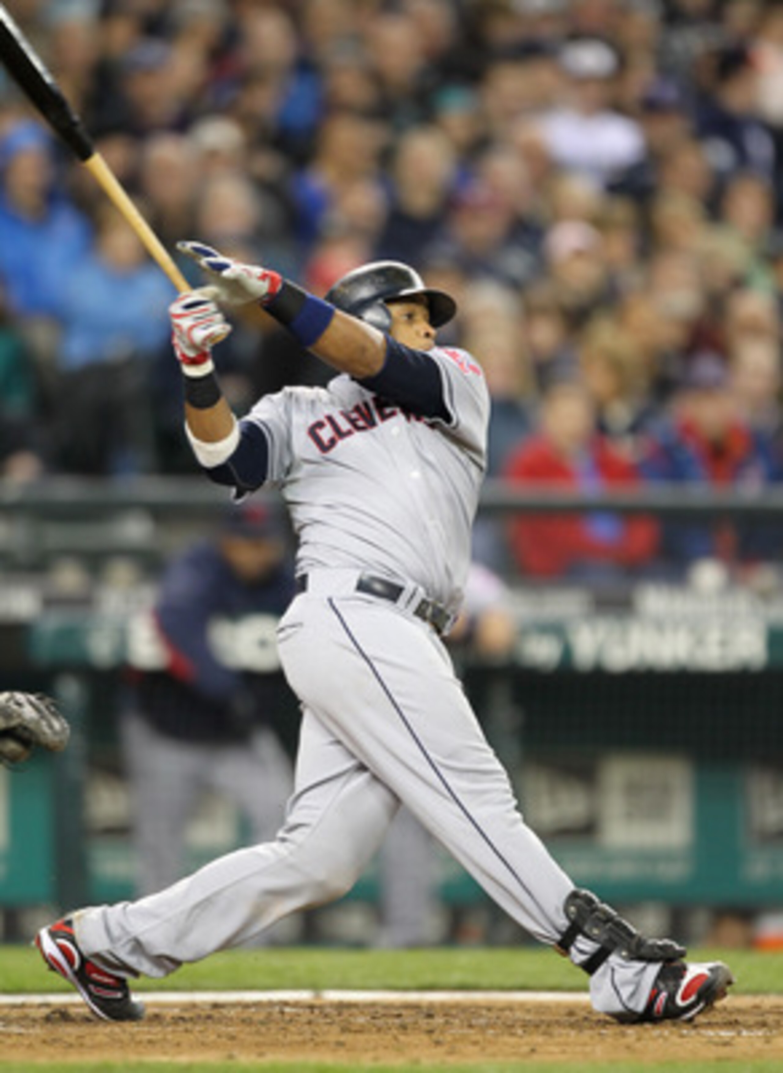 SEATTLE, WA - APRIL 08:  Carlos Santana #41 of the Cleveland Indians bats against the Seattle Mariners during the Mariners' home opener at Safeco Field on April 8, 2011 in Seattle, Washington. (Photo by Otto Greule Jr/Getty Images)