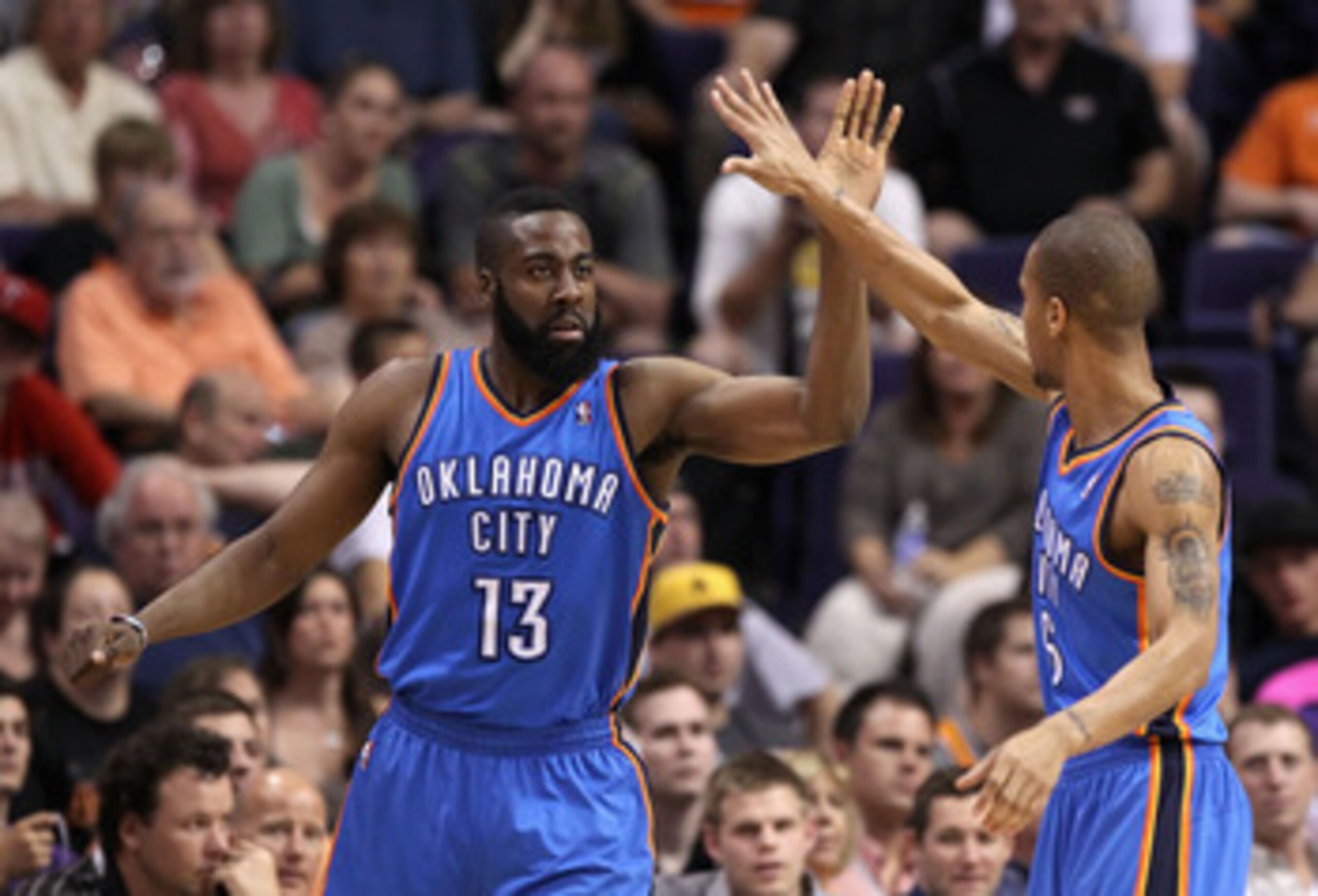 PHOENIX, AZ - MARCH 30: James Harden #13 of the Oklahoma City Thunder high fives teamate Eric Maynor #6 after scoring against the Phoenix Suns during the NBA game at US Airways Center on March 30, 2011 in Phoenix, Arizona. The Thunder defeated the Suns 1 PHOENIX, AZ - MARCH 30: James Harden #13 of the Oklahoma City Thunder high fives teamate Eric Maynor #6 after scoring against the Phoenix Suns during the NBA game at US Airways Center on March 30, 2011 in Phoenix, Arizona. The Thunder defeated the Suns 1