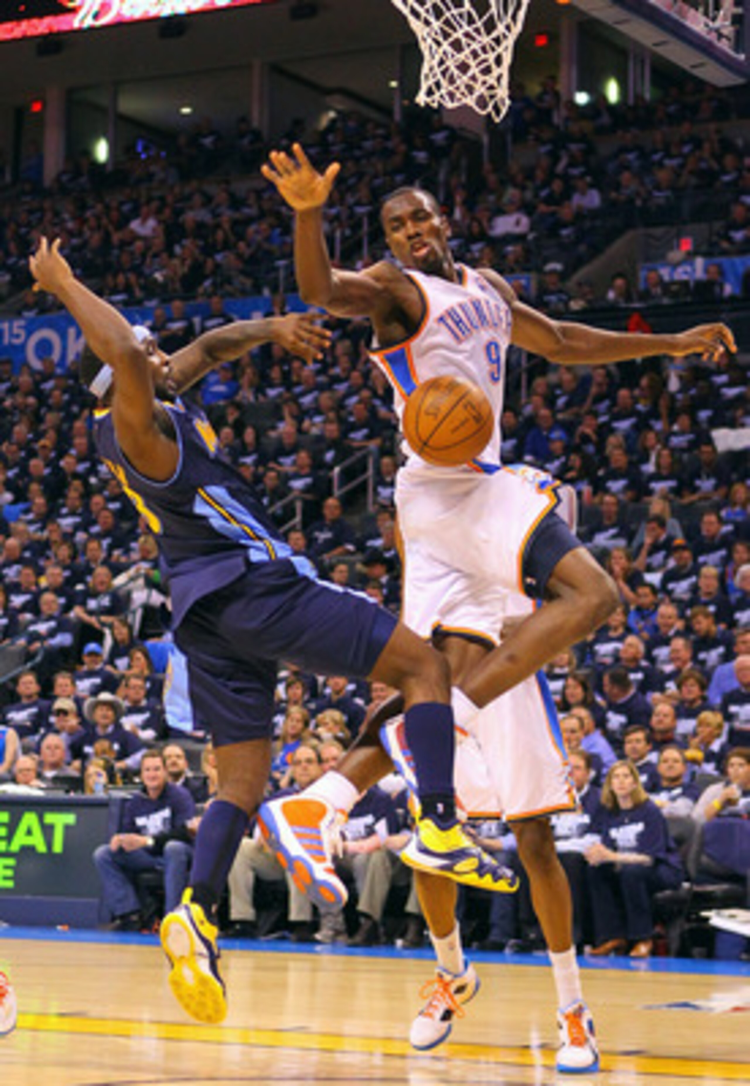 OKLAHOMA CITY, OK - APRIL 27: Ty Lawson #3 of the Denver Nuggets looses control of the ball against Serge Ibaka #9 of the Oklahoma City Thunder in Game Five of the Western Conference Quarterfinals in the 2011 NBA Playoffs on April 27, 2011 at the Ford Cen OKLAHOMA CITY, OK - APRIL 27: Ty Lawson #3 of the Denver Nuggets looses control of the ball against Serge Ibaka #9 of the Oklahoma City Thunder in Game Five of the Western Conference Quarterfinals in the 2011 NBA Playoffs on April 27, 2011 at the Ford Cen