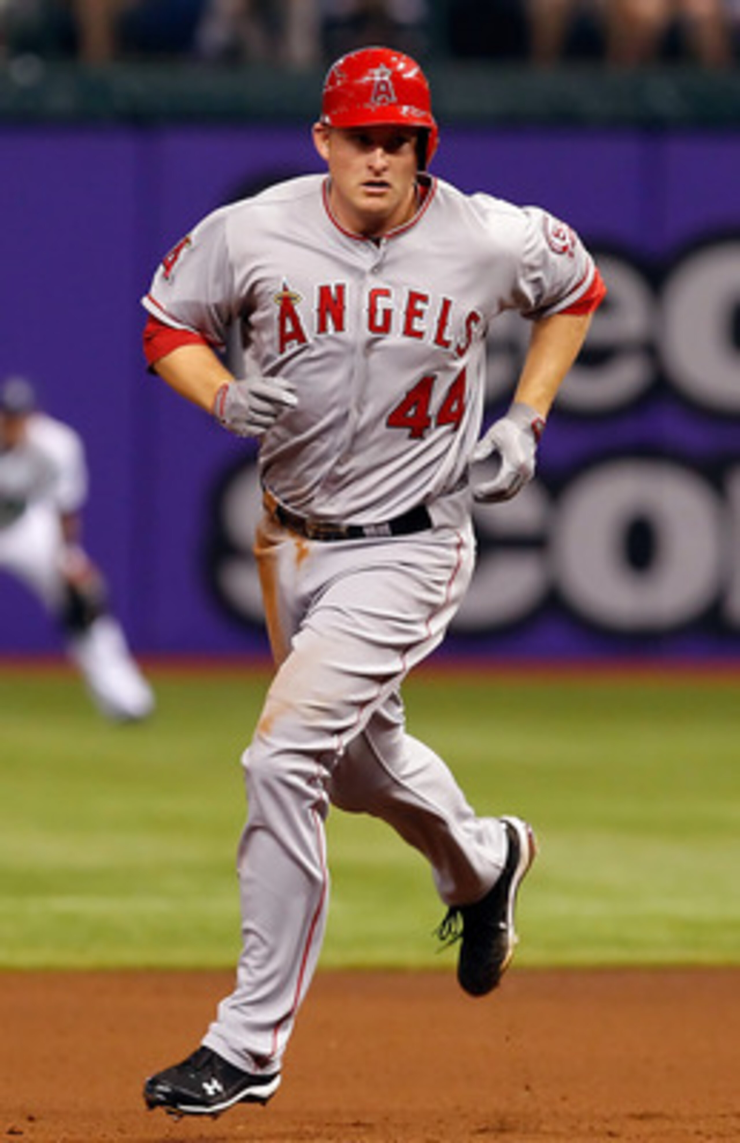 ST. PETERSBURG, FL - APRIL 29:  First baseman Mark Trumbo #44 of the Los Angeles Angels of Anaheim rounds the bases after his two run home run against the Tampa Bay Rays during the game at Tropicana Field on April 29, 2011 in St. Petersburg, Florida.  (Ph