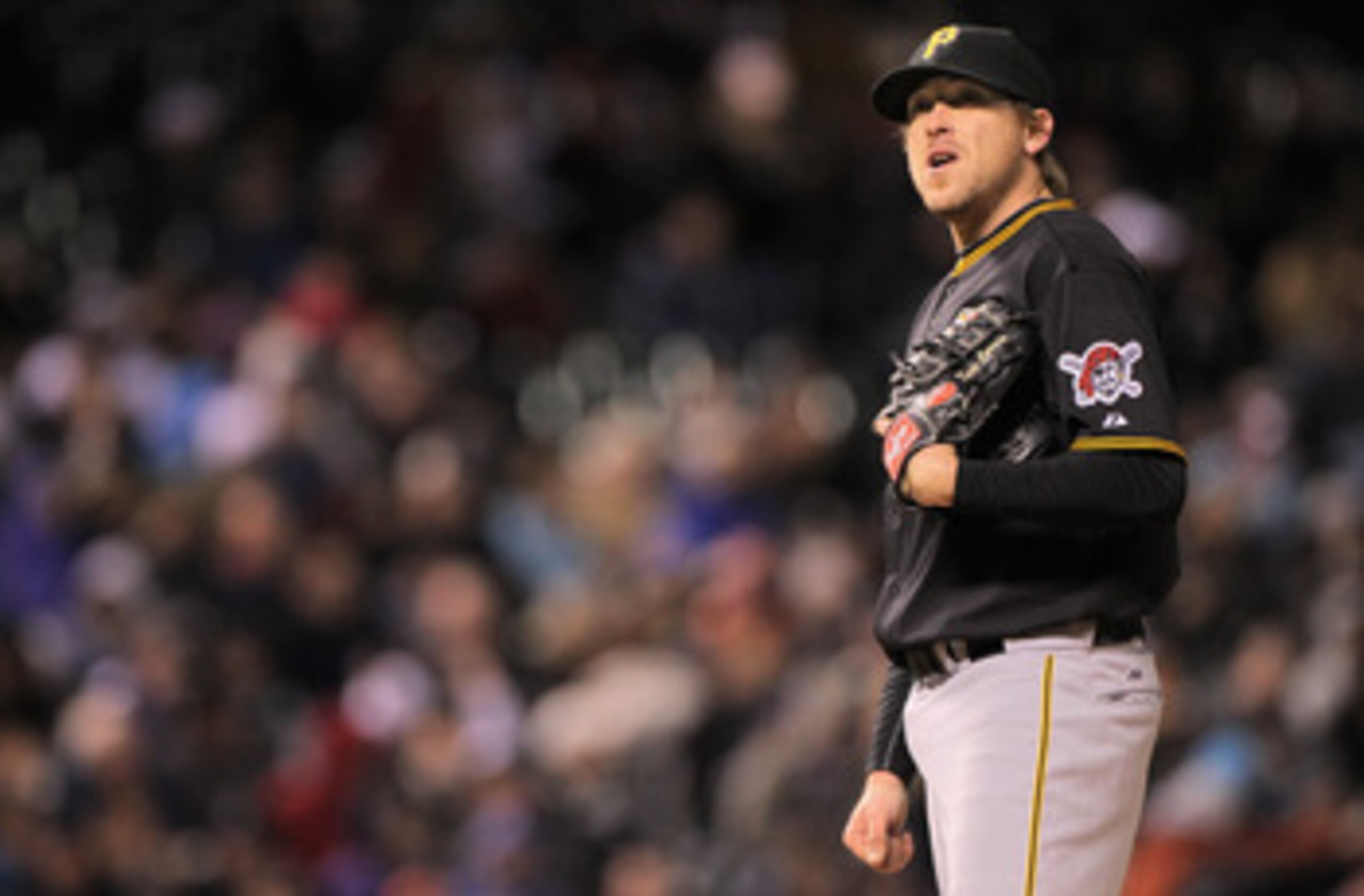 DENVER, CO - APRIL 29:  Starting pitcher Kevin Correia #29 of the Pittsburgh Pirates looks on just before exiting the game agains the Colorado Rockies in the seventh inning at Coors Field on April 29, 2011 in Denver, Colorado. Correia earned the win as th