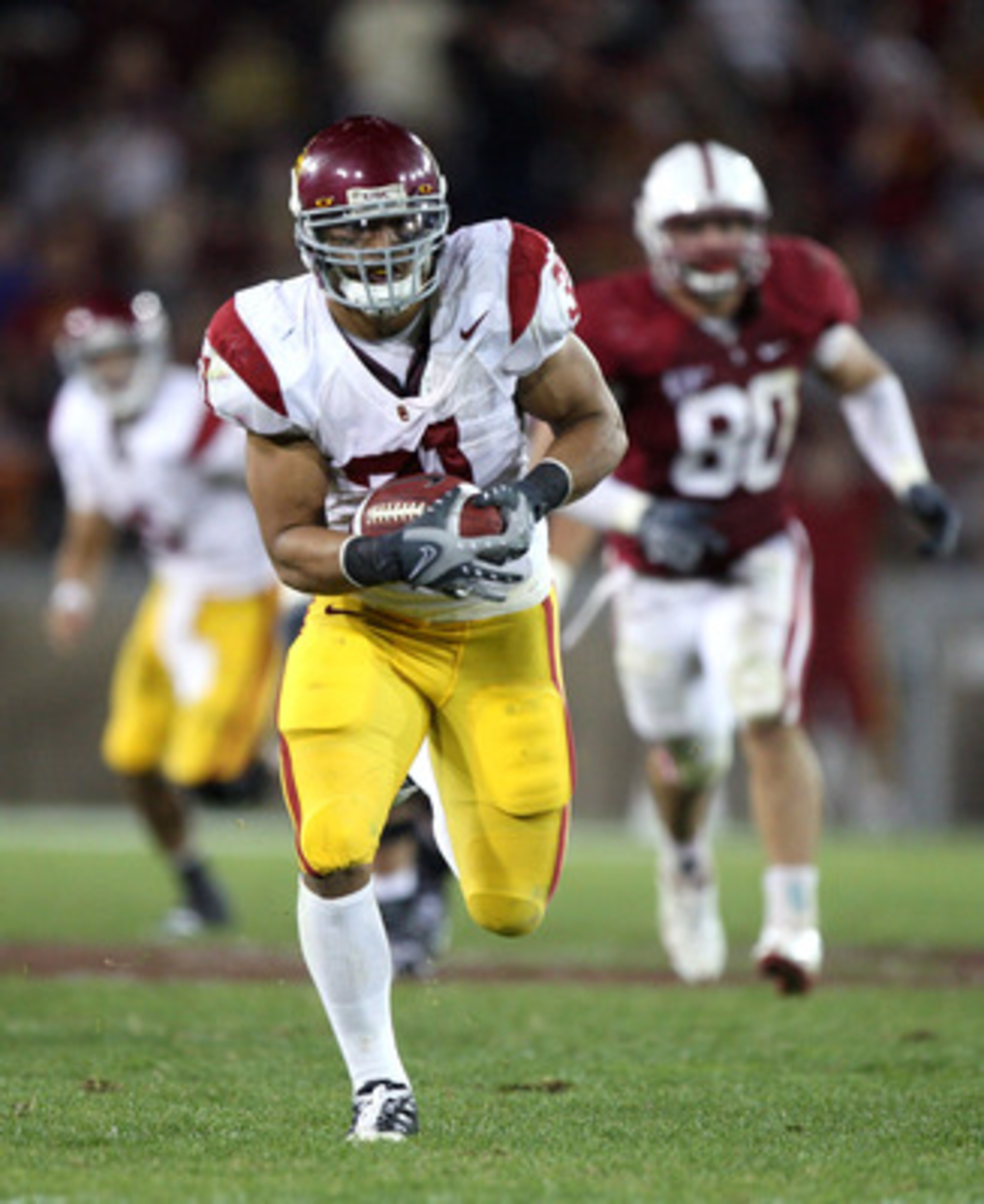 STANFORD, CA - NOVEMBER 15: Stanley Havili #31 of USC Trojans runs for a touchdown in the second half against the Stanford Cardinals at Stanford Stadium on November 15, 2008 in Stanford, California.  (Photo by Jed Jacobsohn/Getty Images)
