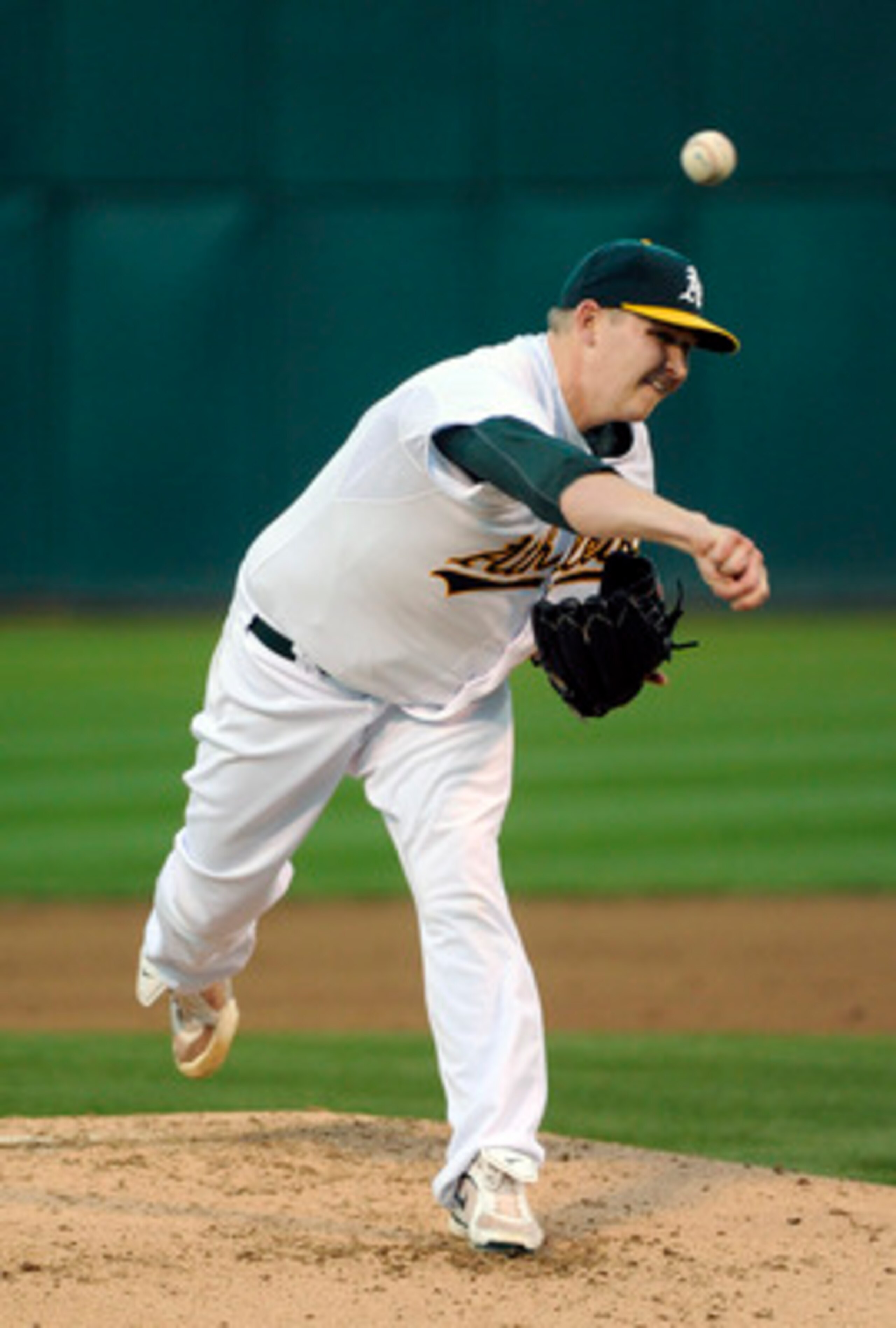 OAKLAND, CA - APRIL 29: Trevor Cahill #53 of the Oakland Athletics pitches against the Texas Rangers during a MLB baseball game at the Oakland-Alameda County Coliseum April 29, 2011 in Oakland, California. (Photo by Thearon W. Henderson/Getty Images)
