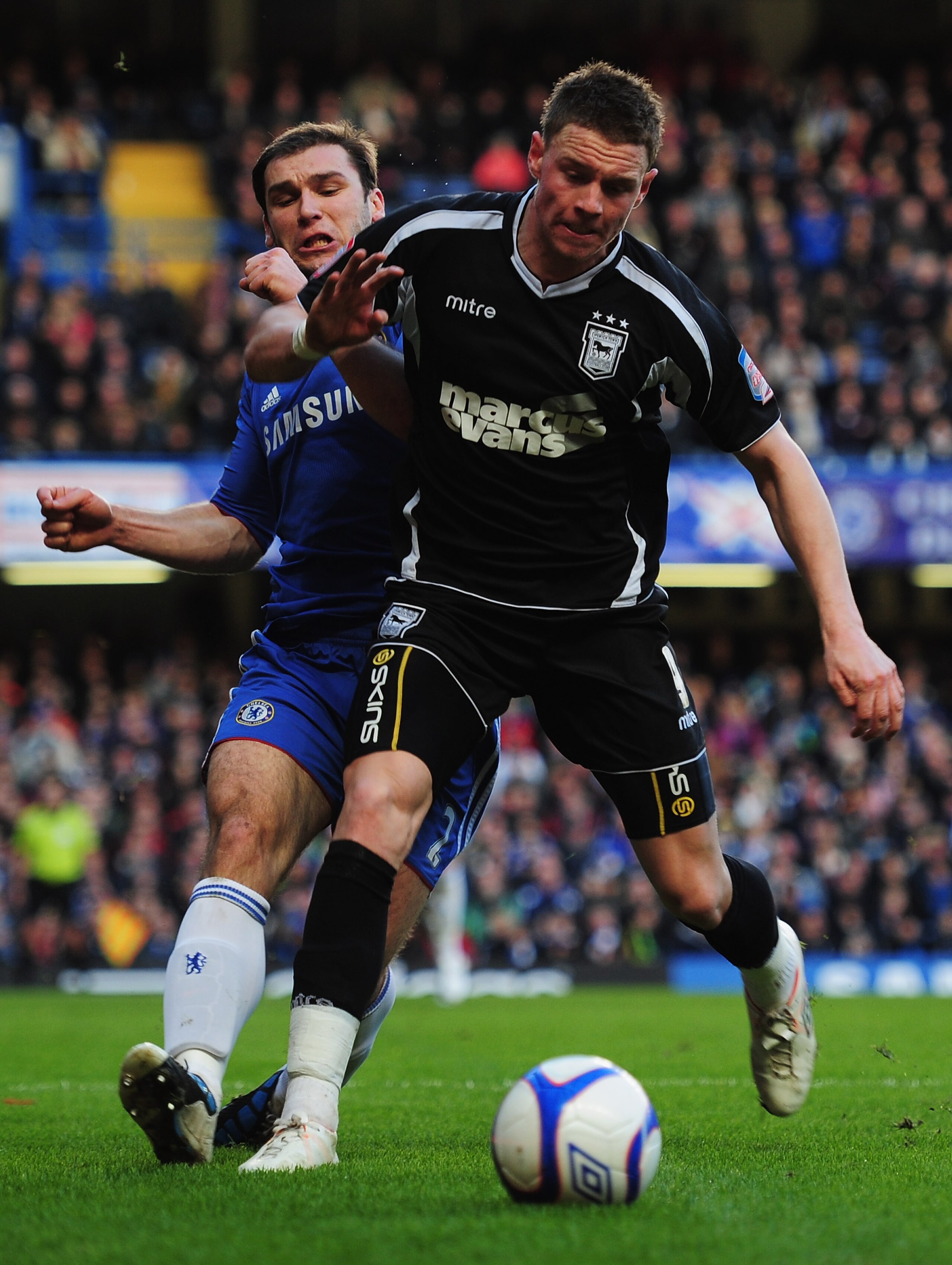 LONDON, ENGLAND - JANUARY 09:  Connor Wickham of Ipswich Town  holds off Branislav Ivanovic of Chelsea during the FA Cup sponsored by E.ON 3rd round match between Chelsea and Ipswich Town at Stamford Bridge on January 9, 2011 in London, England.  (Photo b