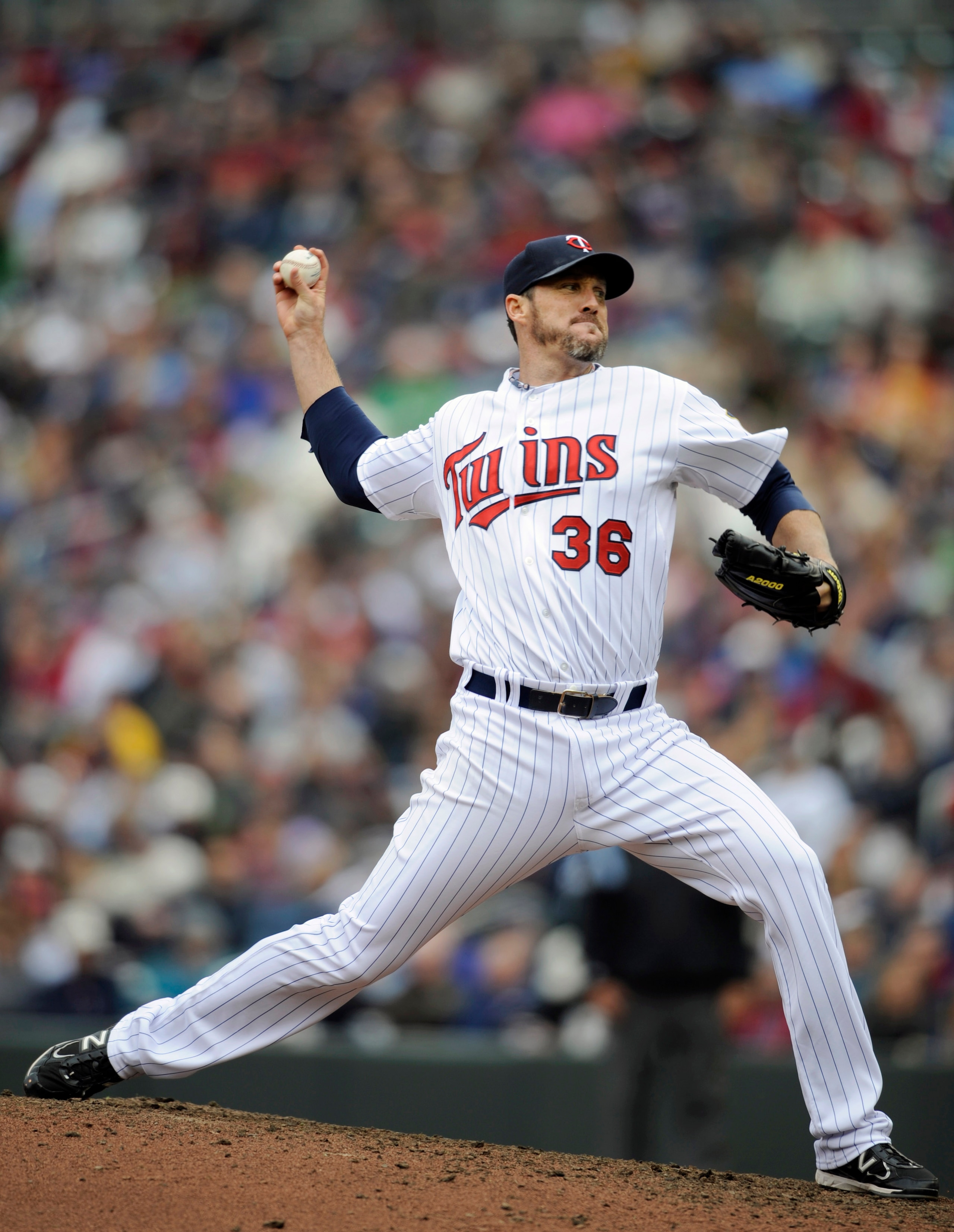 MINNEAPOLIS, MN - APRIL 23: Joe Nathan #36 of the Minnesota Twins pitches against the Cleveland Indians during the ninth inning of their game on April 23, 2011 at Target Field in Minneapolis, Minnesota. (Photo by Hannah Foslien/Getty Images)