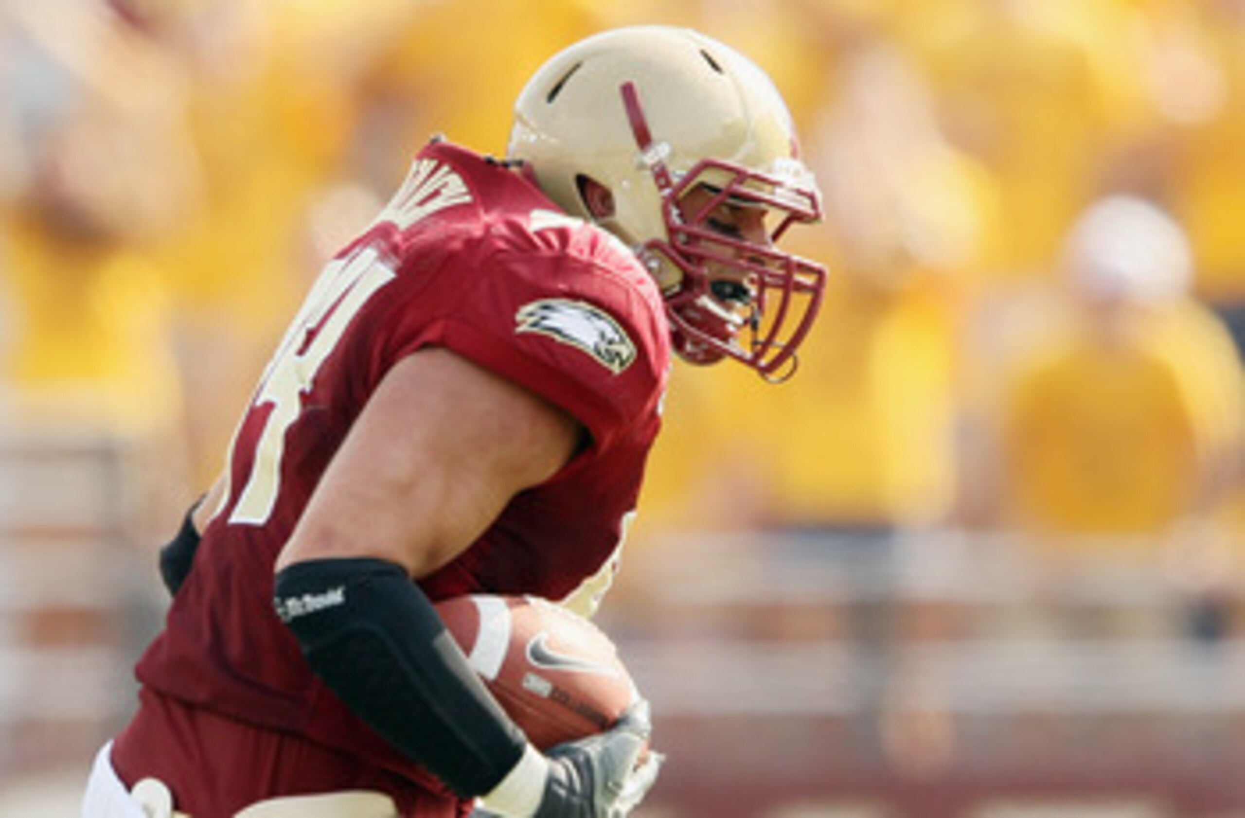 CHESTNUT HILL, MA - SEPTEMBER 25: Mark Herzlich #94 of the Boston College Eagles carries the ball after he intercepted a pass from Tyrod Taylor of the Virginia Tech Hokies on September 25, 2010 at Alumni Stadium in Chestnut Hill, Massachusetts. Virginia CHESTNUT HILL, MA - SEPTEMBER 25: Mark Herzlich #94 of the Boston College Eagles carries the ball after he intercepted a pass from Tyrod Taylor of the Virginia Tech Hokies on September 25, 2010 at Alumni Stadium in Chestnut Hill, Massachusetts. Virginia
