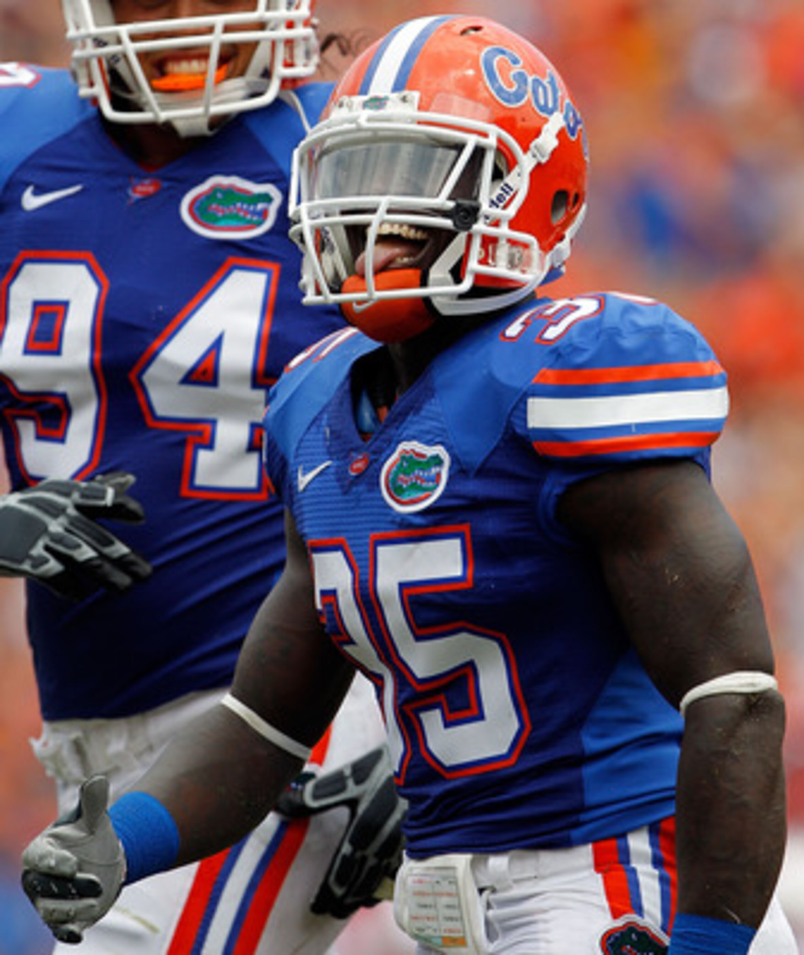 GAINESVILLE, FL - SEPTEMBER 04:  Ahmad Black #35 and Justin Trattou #94 of the Florida Gators celebrate after an interception against the Miami University RedHawks at Ben Hill Griffin Stadium on September 4, 2010 in Gainesville, Florida.  (Photo by Sam Gr