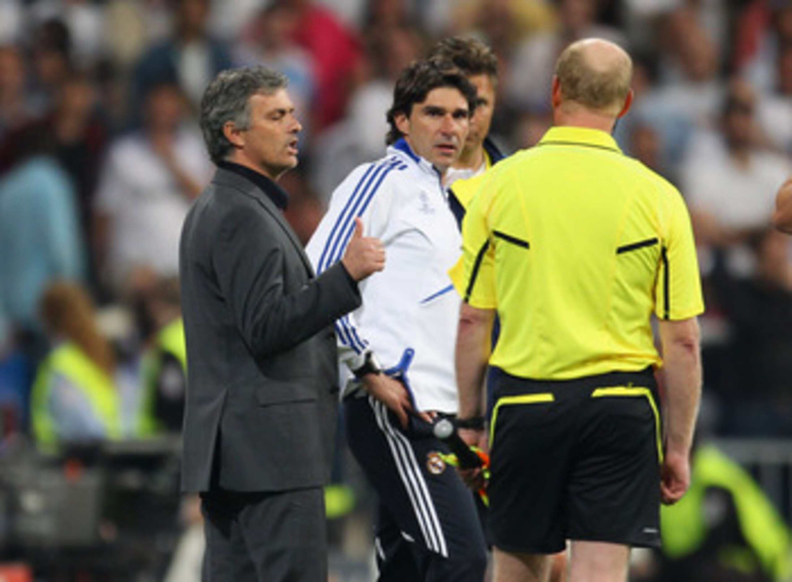 MADRID, SPAIN - APRIL 27:  Jose Mourinho the coach of Real Madrid gives a thumbs up to the assistant referee as he is sent off to the stands during the UEFA Champions League Semi Final first leg match between Real Madrid and Barcelona at Estadio Santiago