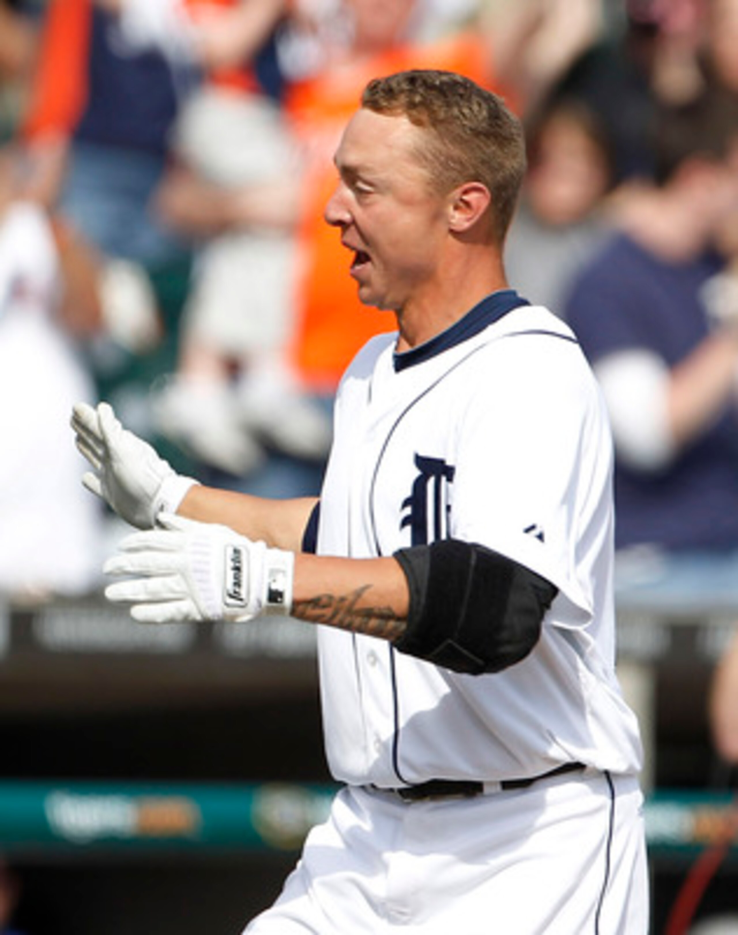 DETROIT - APRIL 13: Brandon Inge #15 of the Detroit Tigers celebrates after hitting a walk off home in the ninth inning during the game against the Texas Rangers at Comerica Park on April 13, 2011 in Detroit, Michigan. The Tigers defeated the Rangers 3-2 DETROIT - APRIL 13: Brandon Inge #15 of the Detroit Tigers celebrates after hitting a walk off home in the ninth inning during the game against the Texas Rangers at Comerica Park on April 13, 2011 in Detroit, Michigan. The Tigers defeated the Rangers 3-2