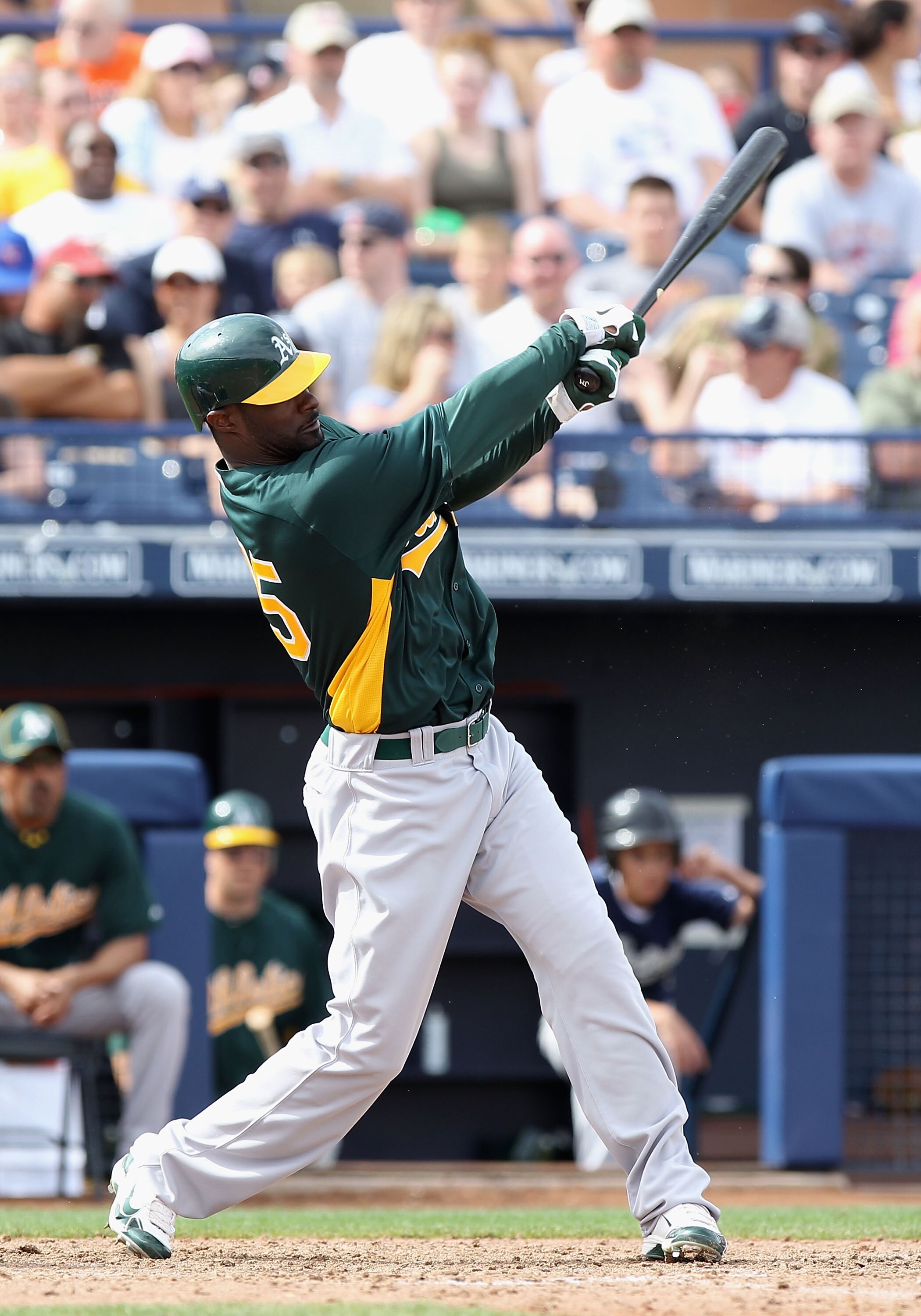 PEORIA, AZ - MARCH 06:  Jai Miller #58 of the Oakland Athletics bats against the San Diego Padres during the spring training game at Peoria Stadium on March 6, 2011 in Peoria, Arizona.  (Photo by Christian Petersen/Getty Images)