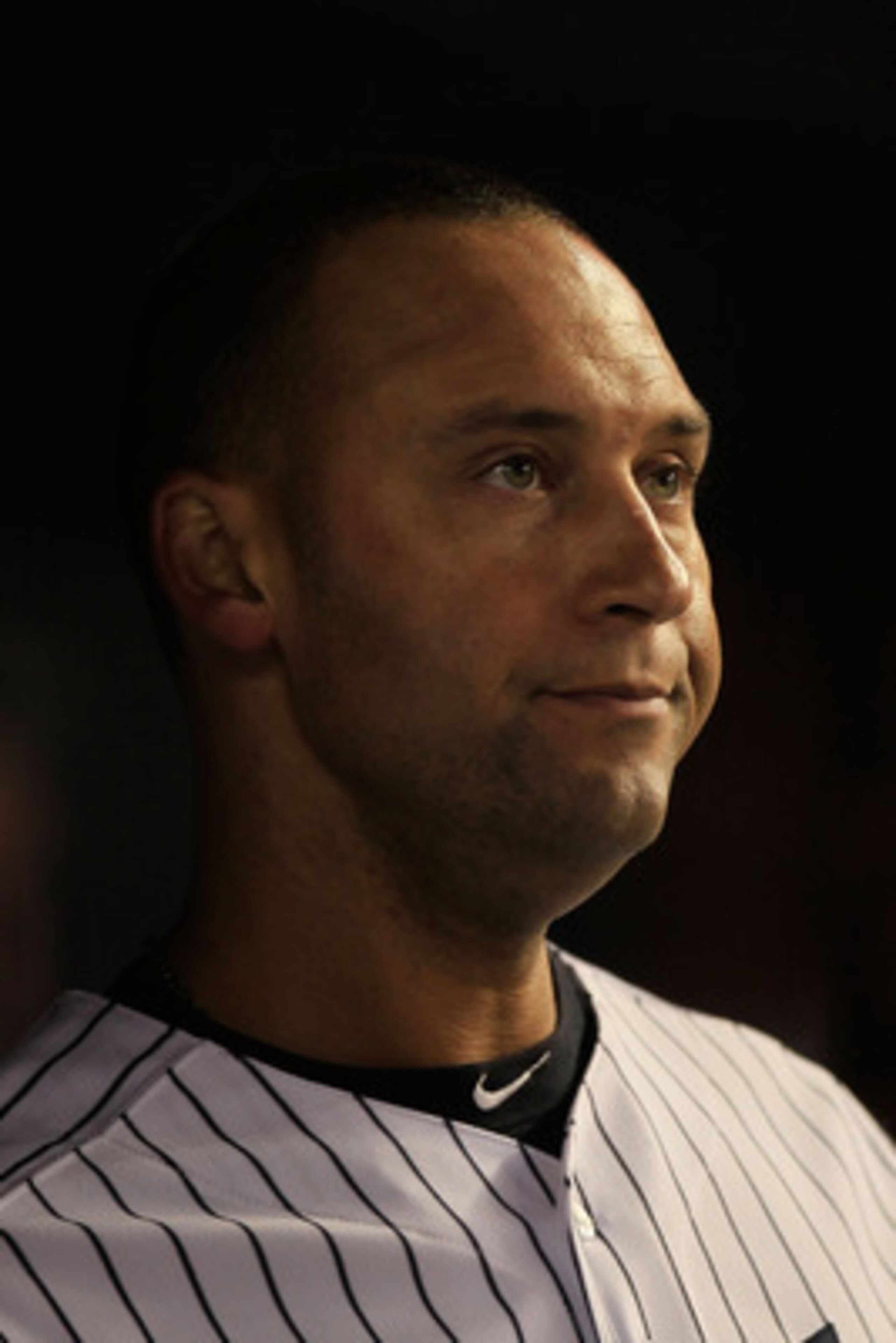 NEW YORK, NY - APRIL 25:  Derek Jeter #2 of the New York Yankees looks on from the dugout during the game against the Chicago White Sox at Yankee Stadium on April 25, 2011 in the Bronx borough of New York City.  (Photo by Chris Trotman/Getty Images)