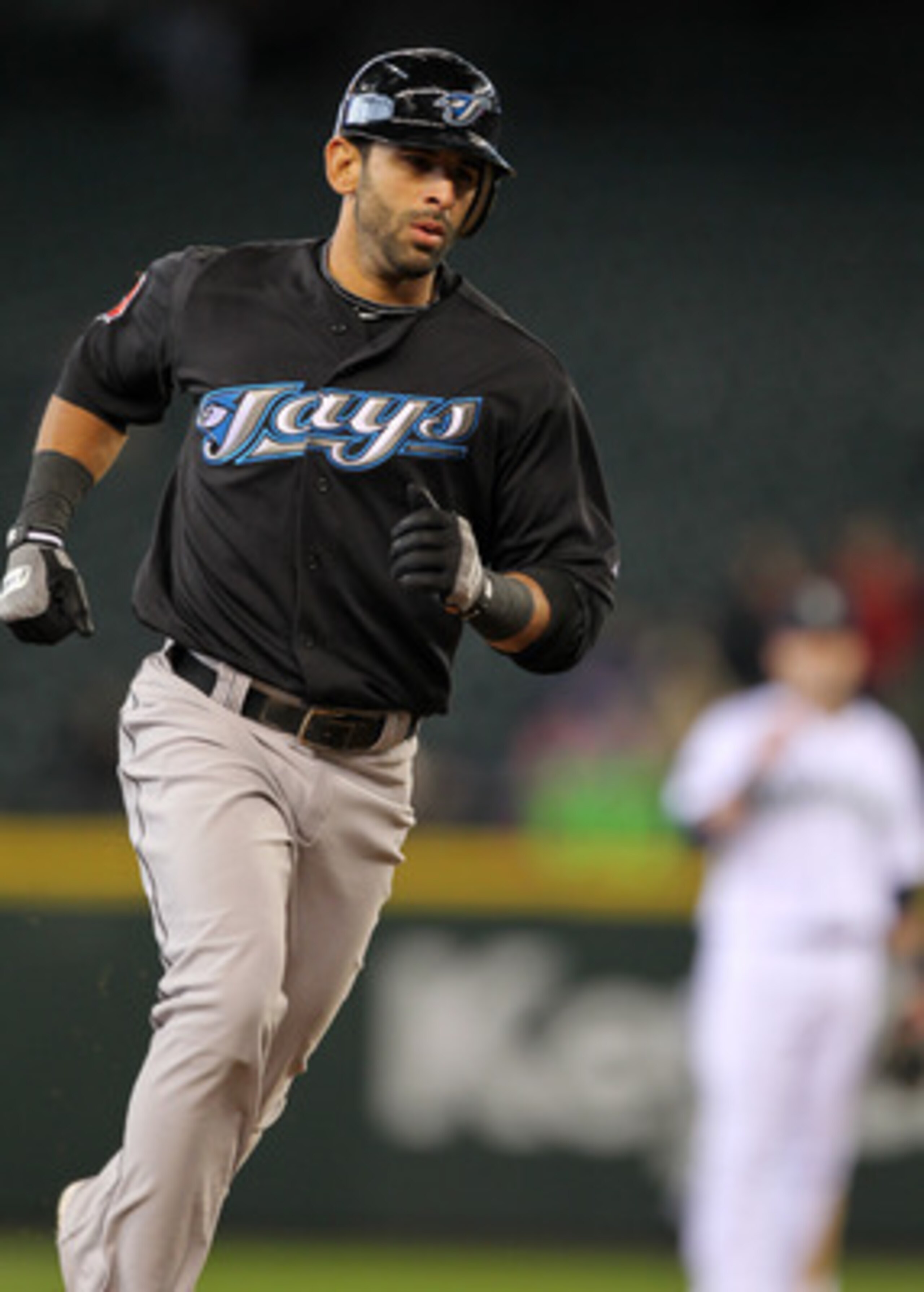 SEATTLE, WA - APRIL 13:  Jose Bautista #19 of the Toronto Blue Jays rounds the bases after hitting a three run homer in the eighth inning against the Seattle Mariners at Safeco Field on April 13, 2011 in Seattle, Washington. (Photo by Otto Greule Jr/Getty