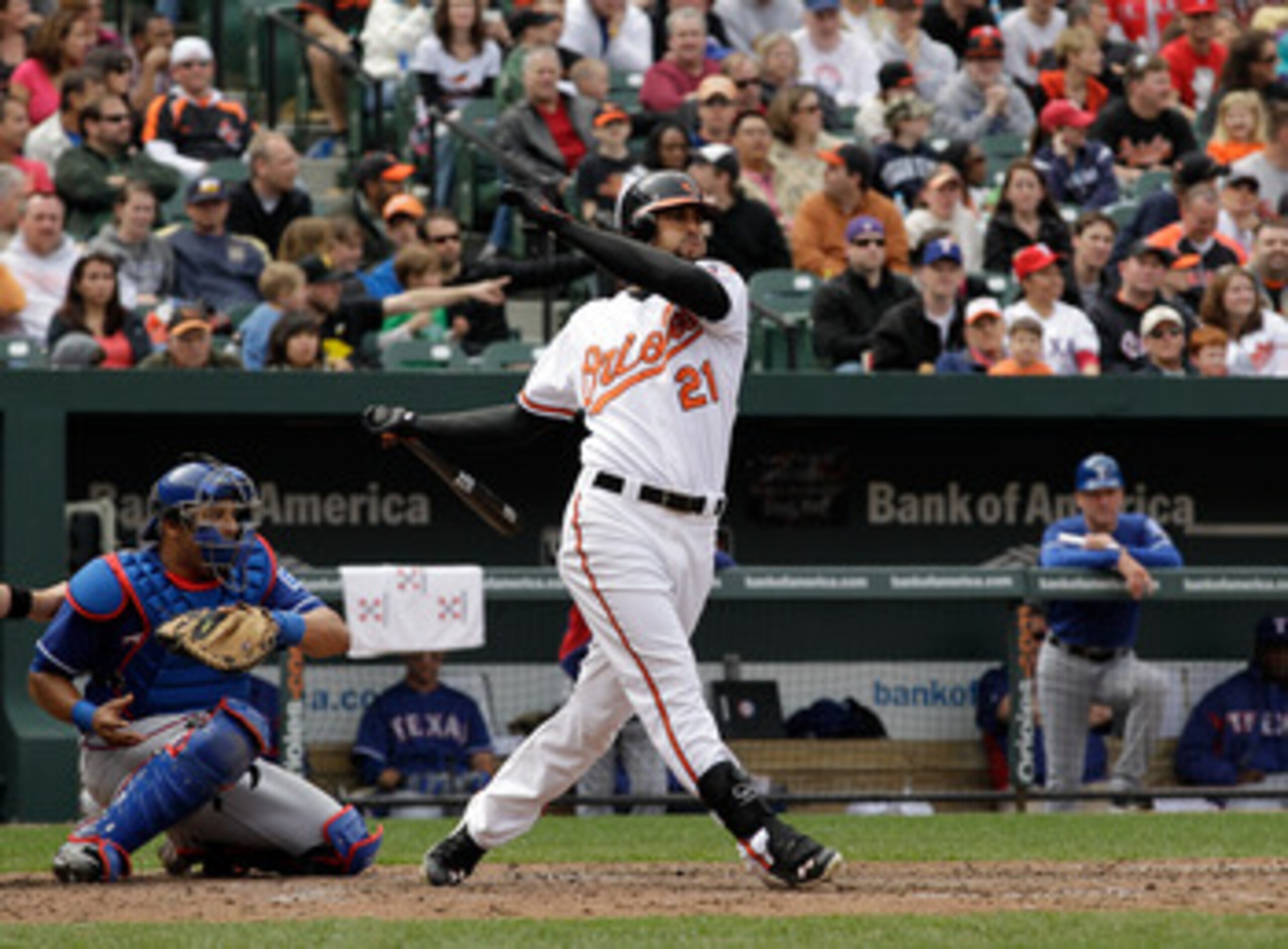 BALTIMORE, MD - APRIL 10:  Nick Markakis #21 of the Baltimore Orioles at the plate against the Texas Rangers at Oriole Park at Camden Yards on April 10, 2011 in Baltimore, Maryland.  (Photo by Rob Carr/Getty Images)