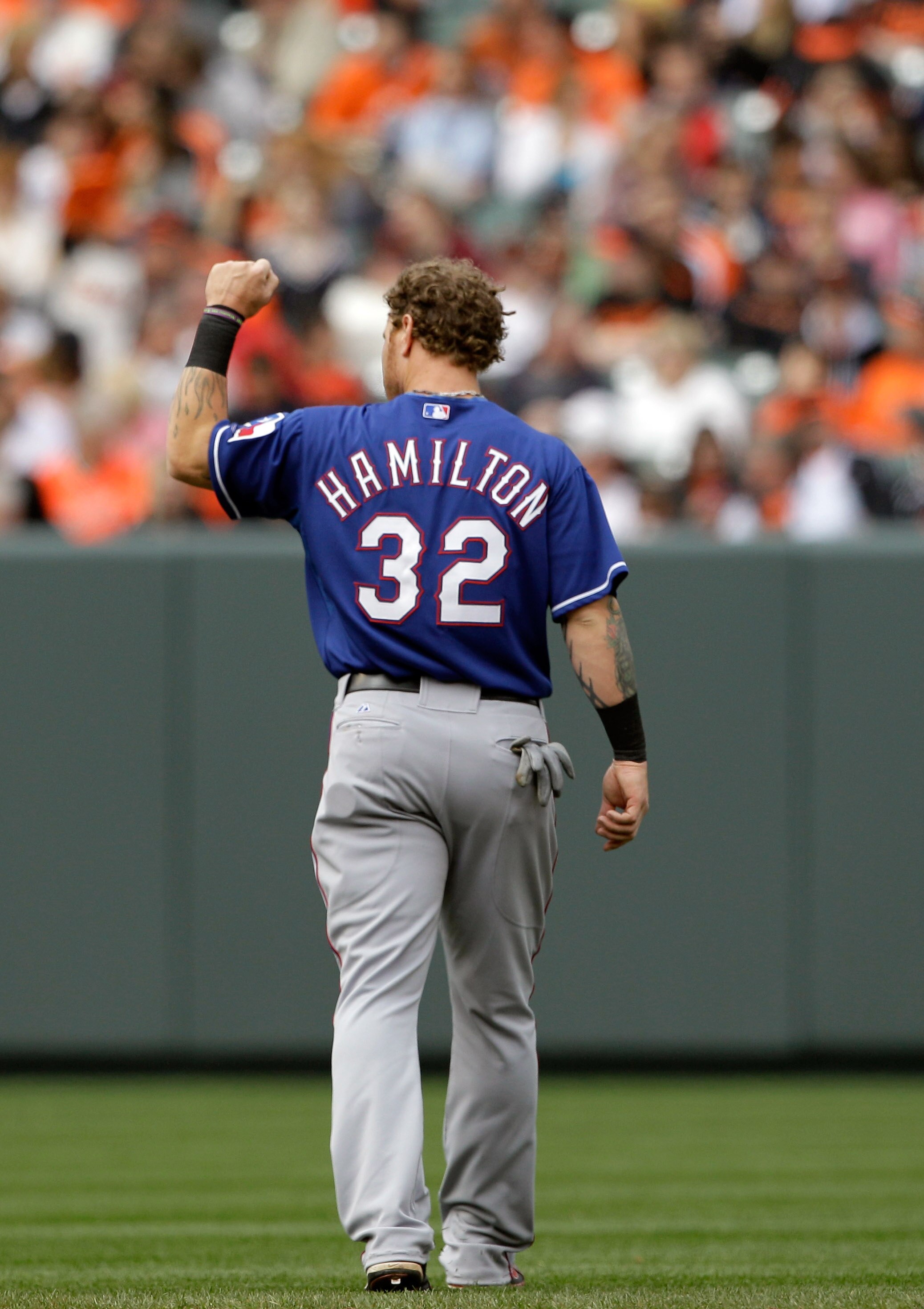 BALTIMORE, MD - APRIL 10: Josh Hamilton #32 of the Texas Rangers walks to the outfield after the end of the seventh inning against the Baltimore Orioles at Oriole Park at Camden Yards on April 10, 2011 in Baltimore, Maryland.  (Photo by Rob Carr/Getty Ima