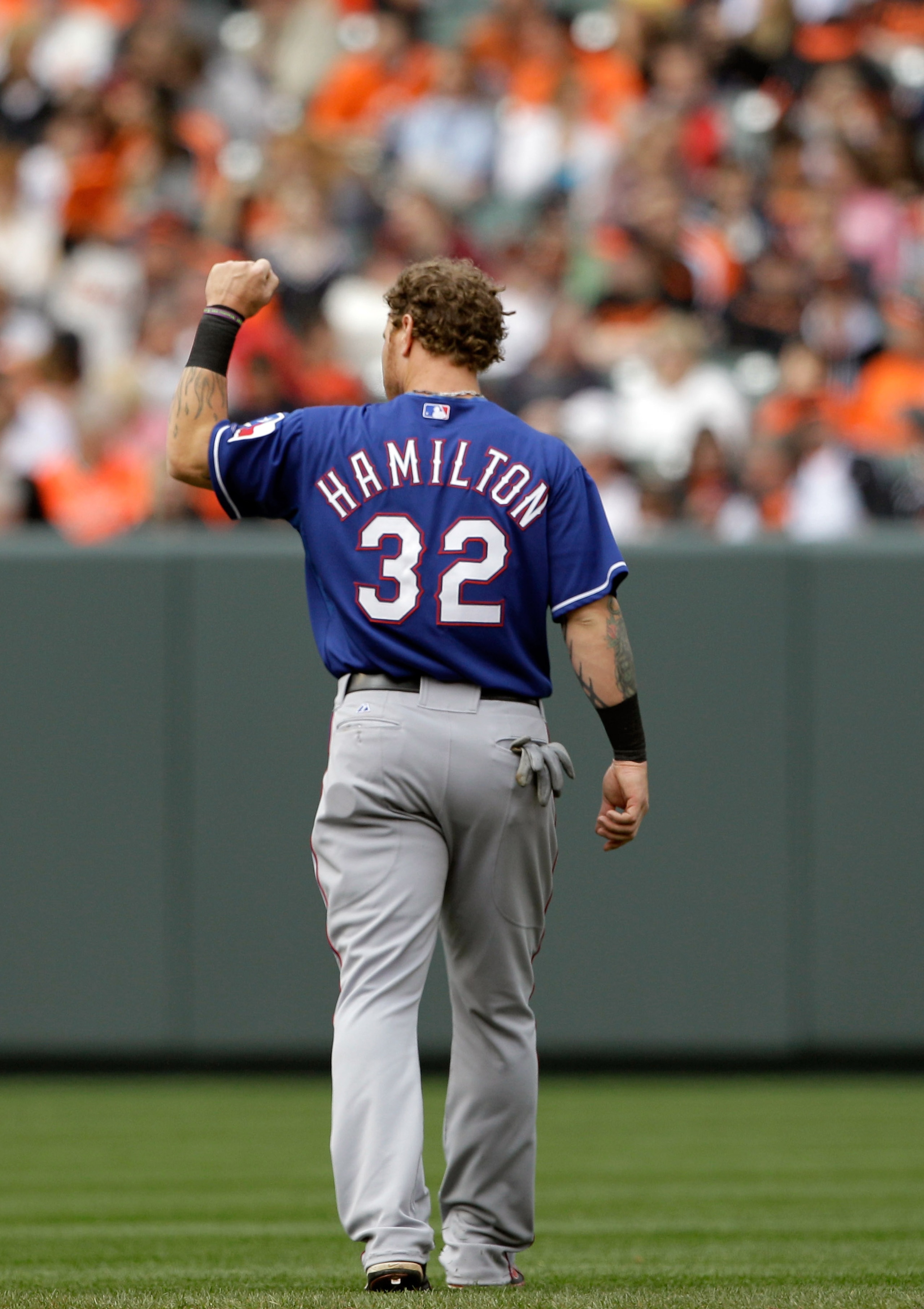 BALTIMORE, MD - APRIL 10: Josh Hamilton #32 of the Texas Rangers walks to the outfield after the end of the seventh inning against the Baltimore Orioles at Oriole Park at Camden Yards on April 10, 2011 in Baltimore, Maryland.  (Photo by Rob Carr/Getty Ima