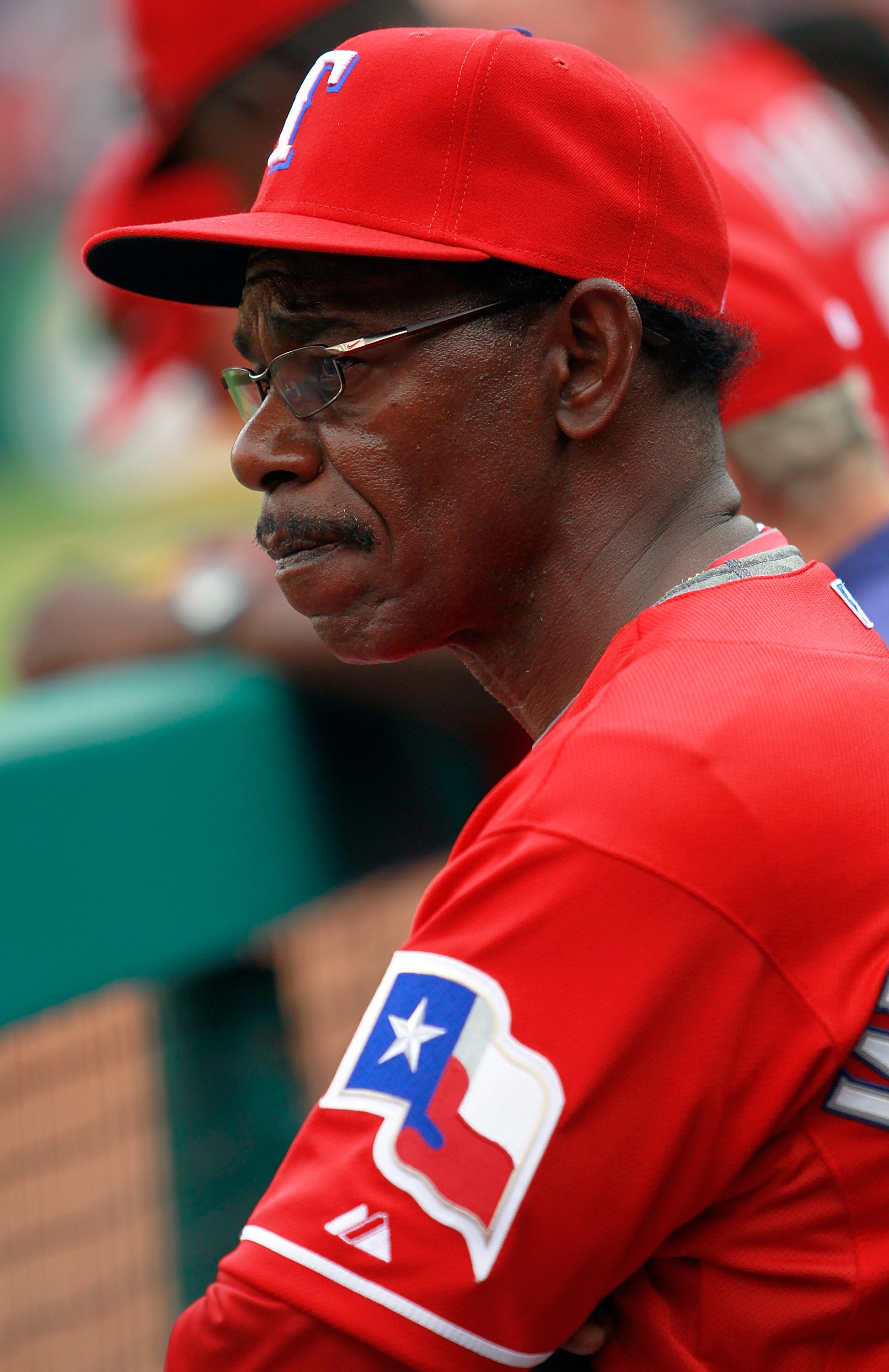 ARLINGTON, TX - APRIL 01:  Manager Ron Washington of the Texas Rangers leads his team against the Boston Red Sox on Opening Day at Rangers Ballpark in Arlington on April 1, 2011 in Arlington, Texas.  (Photo by Tom Pennington/Getty Images)