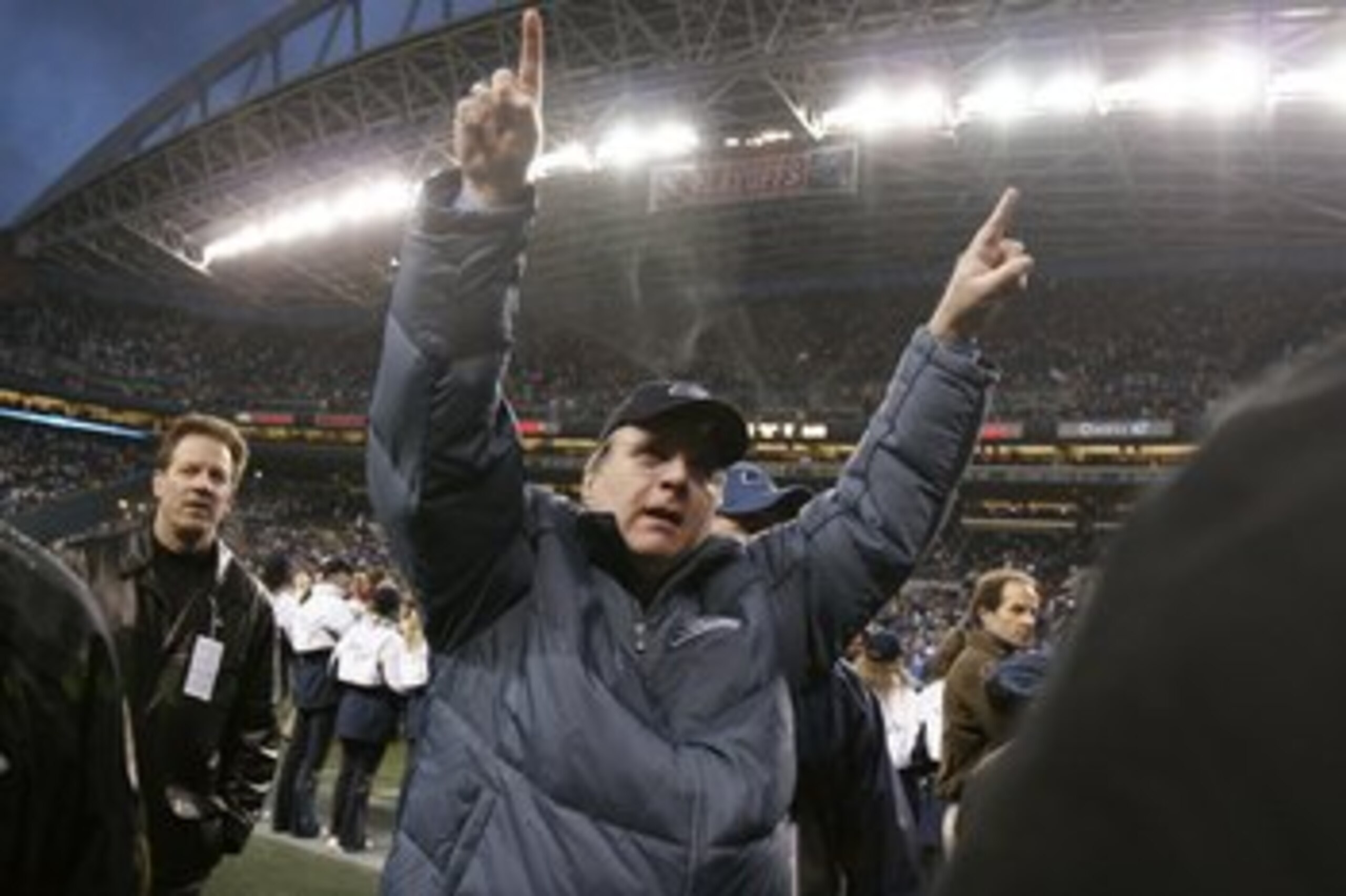 SEATTLE - JANUARY 14:  Paul Allen, owner of the Seattle Seahawks, celebrates the Seahawks' 20-10 victory over the Washington Redskins in the NFC Divisional Playoff game at Qwest Field on January 14, 2006 in Seattle, Washington.  (Photo by Otto Greule Jr/G
