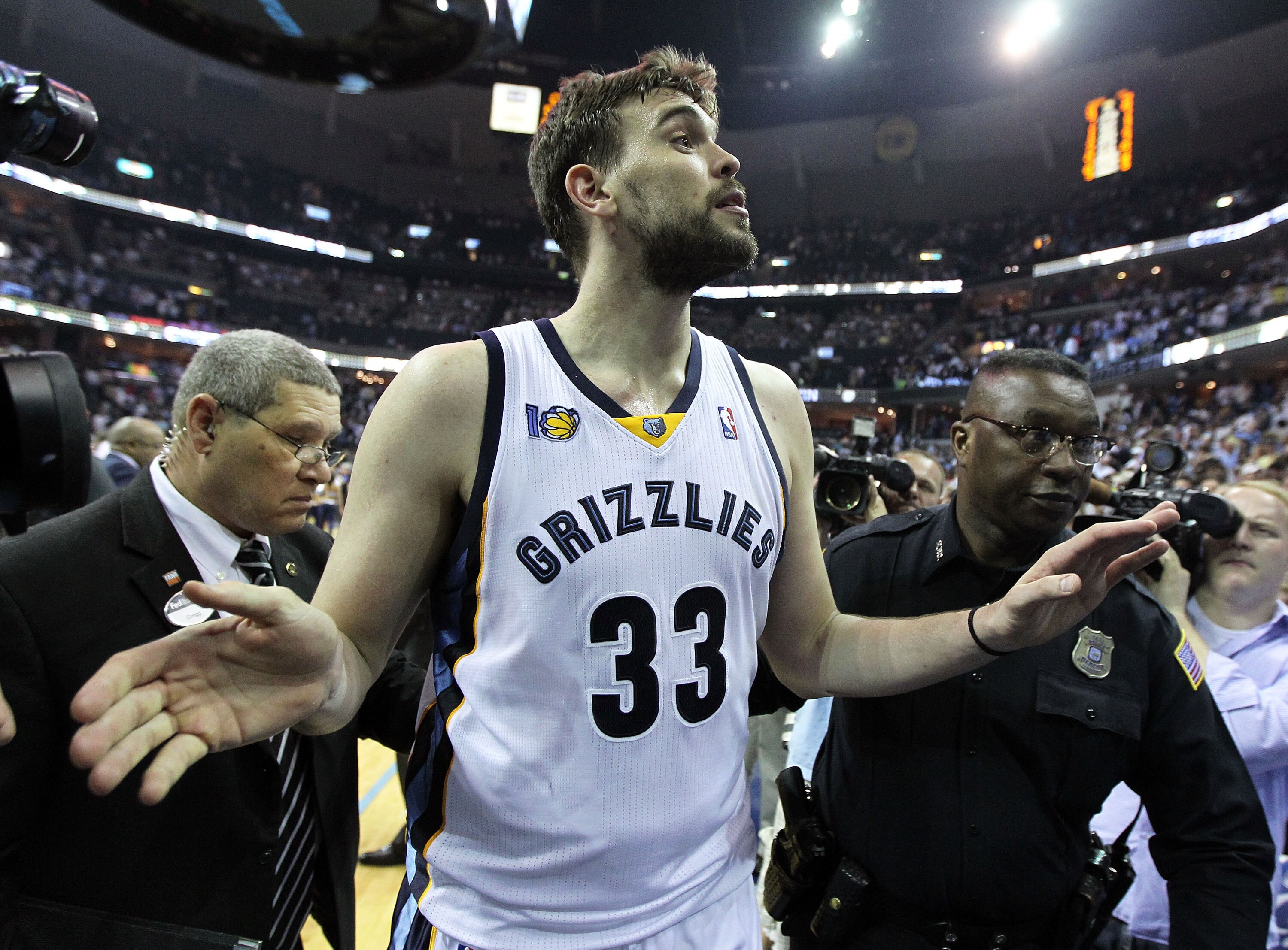 MEMPHIS, TN - APRIL 29: Marc Gasol #33 of the Memphis Grizzlies celebrates after the Grizzlies beat the San Antonio Spurs 99-91 in Game Six of the Western Conference Quarterfinals in the 2011 NBA Playoffs at FedExForum on April 29, 2011 in Memphis, Tenne MEMPHIS, TN - APRIL 29: Marc Gasol #33 of the Memphis Grizzlies celebrates after the Grizzlies beat the San Antonio Spurs 99-91 in Game Six of the Western Conference Quarterfinals in the 2011 NBA Playoffs at FedExForum on April 29, 2011 in Memphis, Tenne